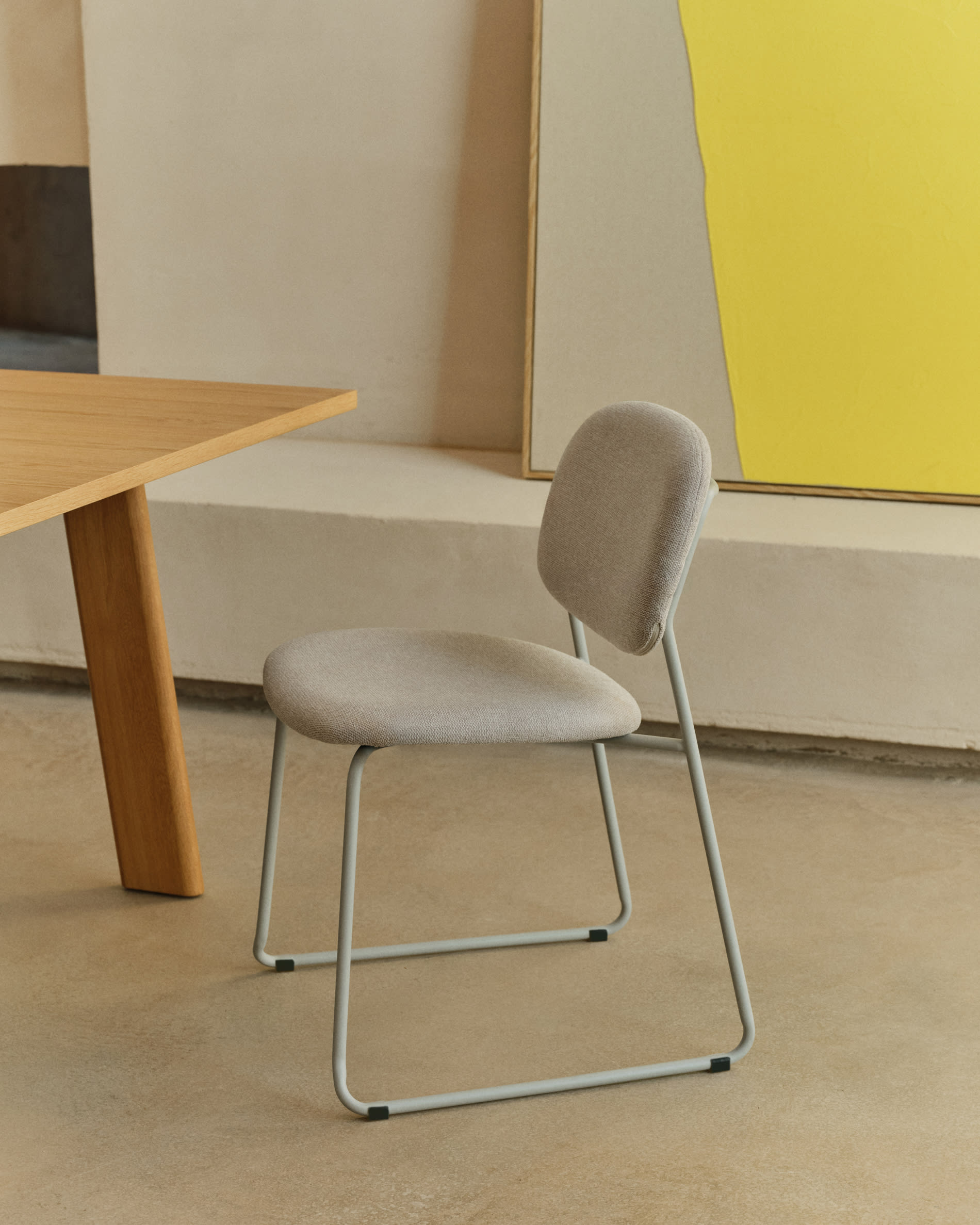 Meli stackable chair in beige chenille with beige metal legs FSC Mix Credit