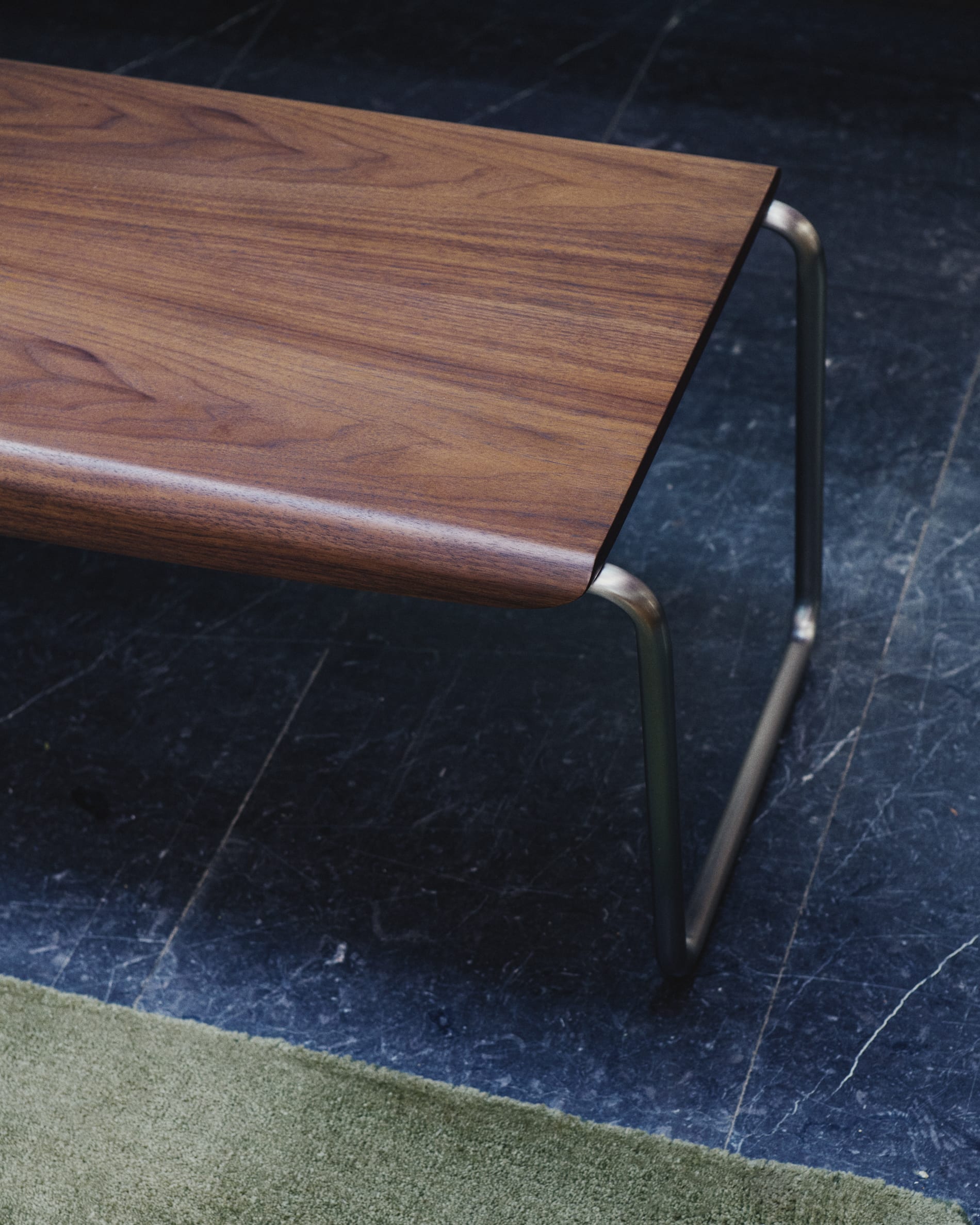 Tarsel bench in walnut veneer with brushed stainless steel structure 142cm