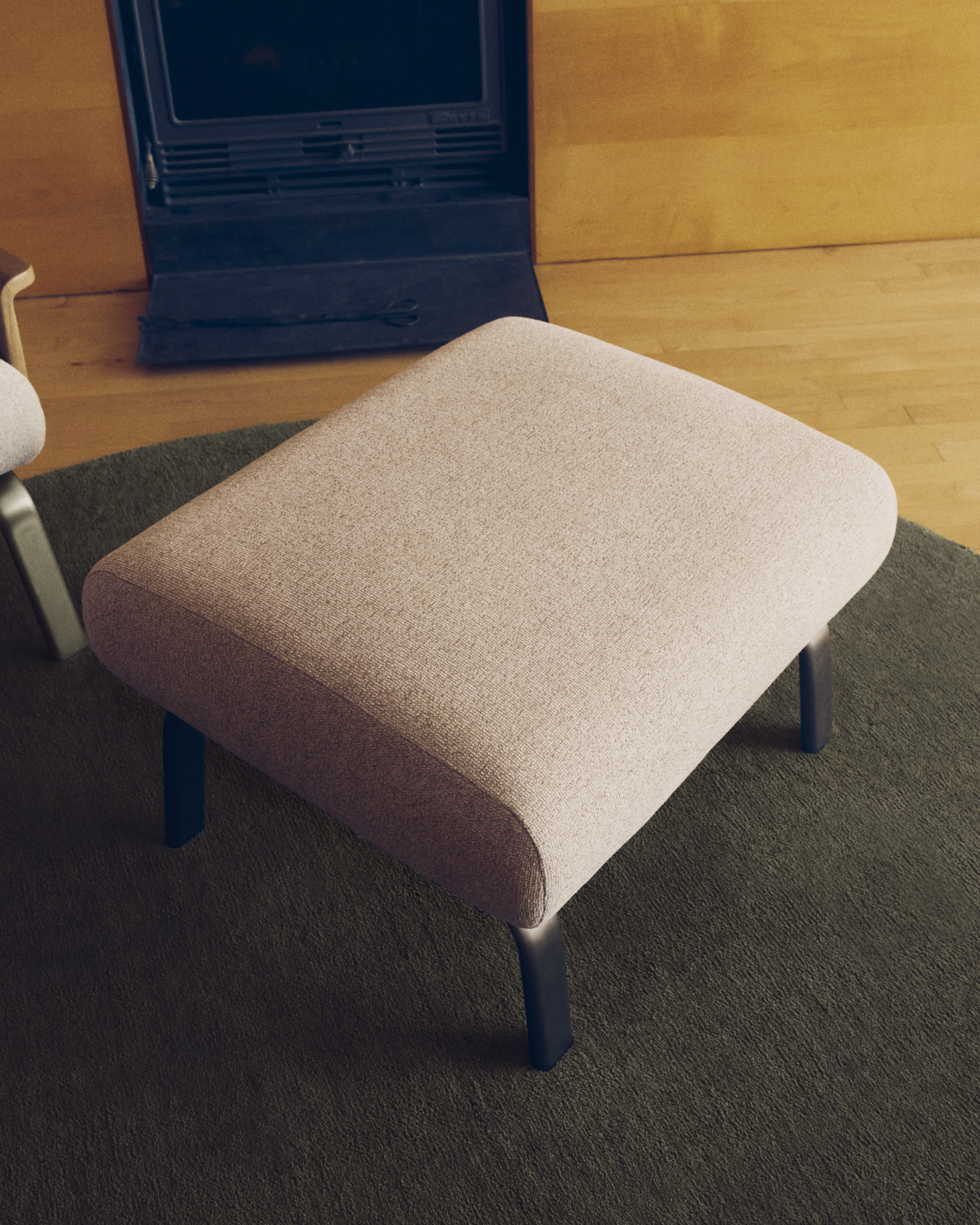 Amsen beige footrest with brushed stainless steel legs 68 x 55 cm