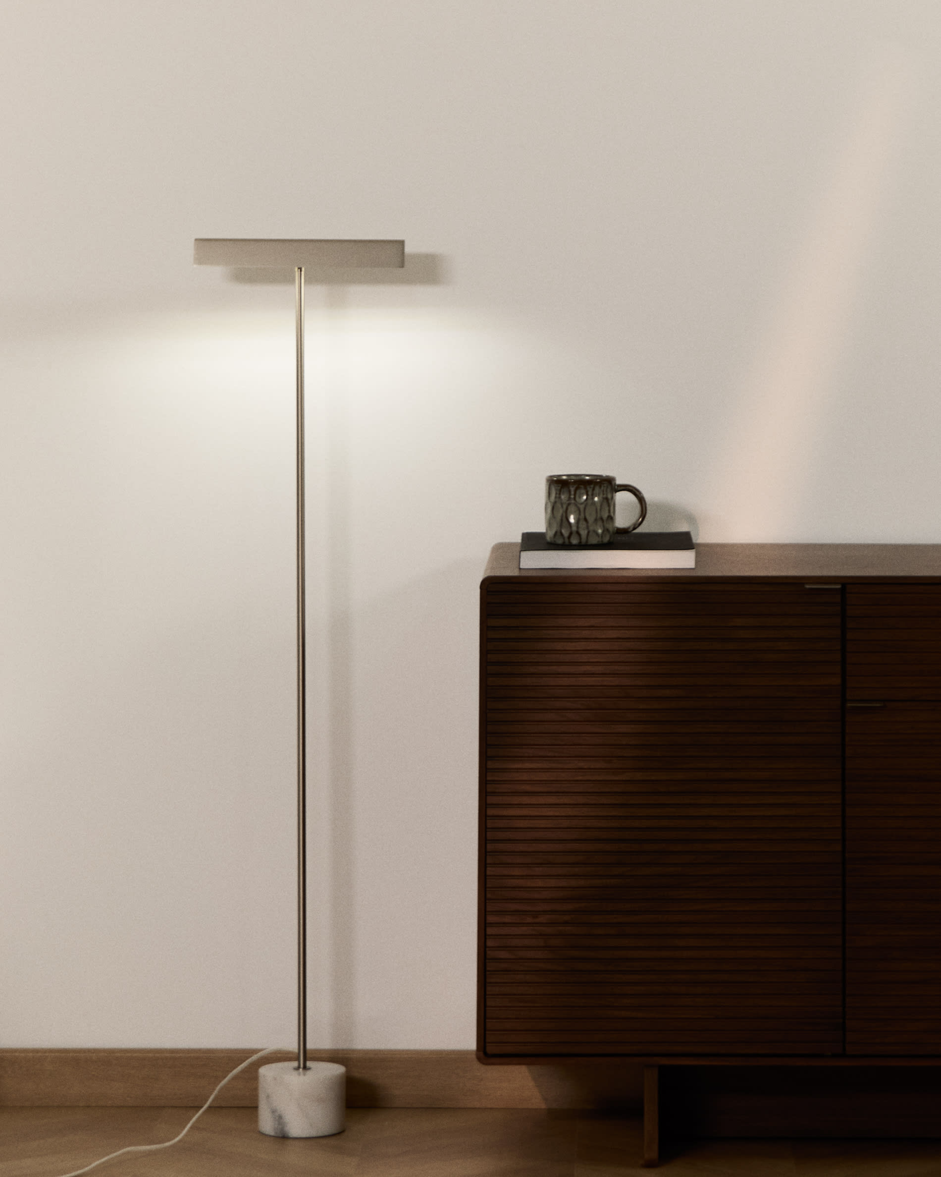 Lynor brushed steel floor lamp with white marble base