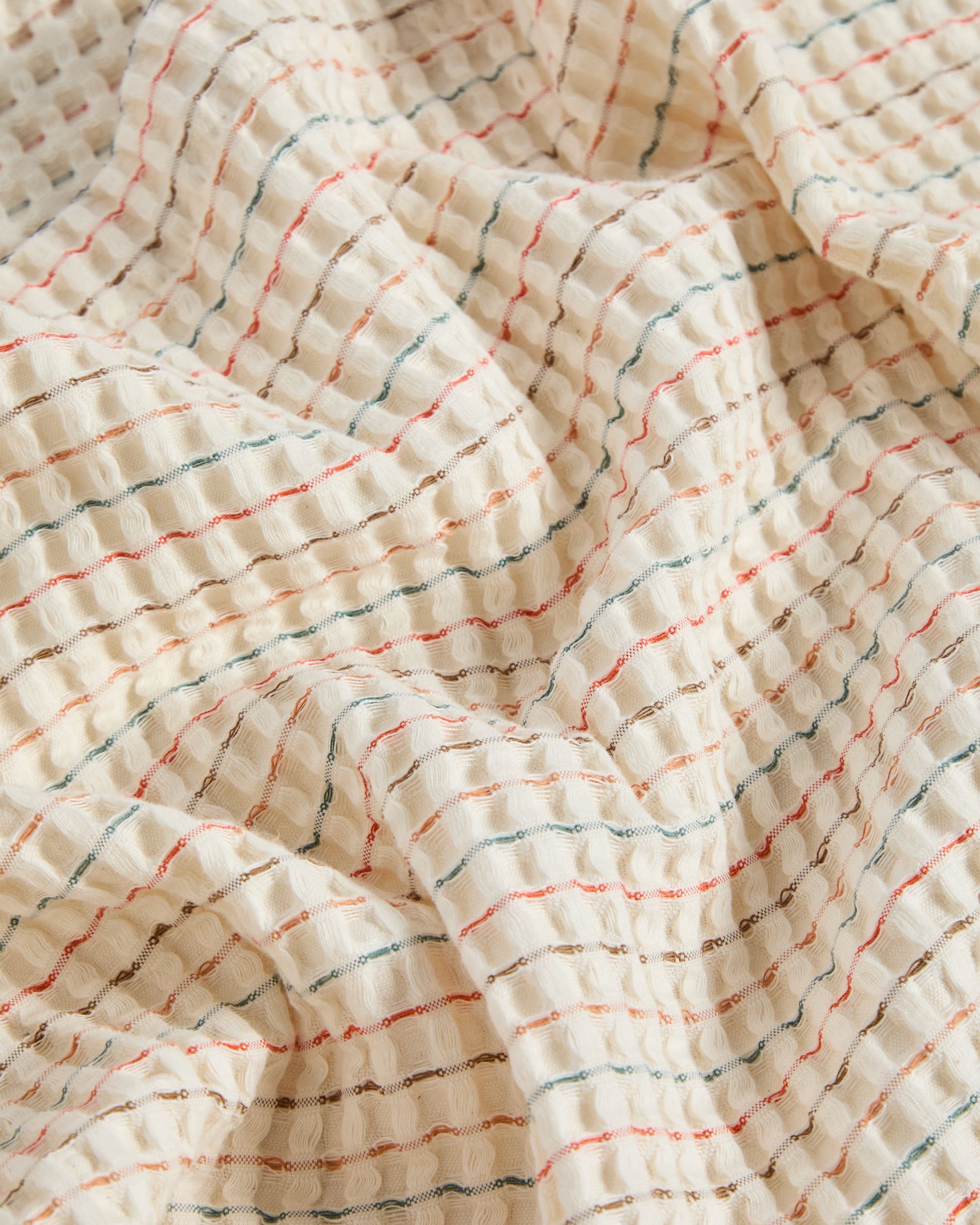 Wufy 100% cotton waffle bedspread in multicolour stripe for convertible cot