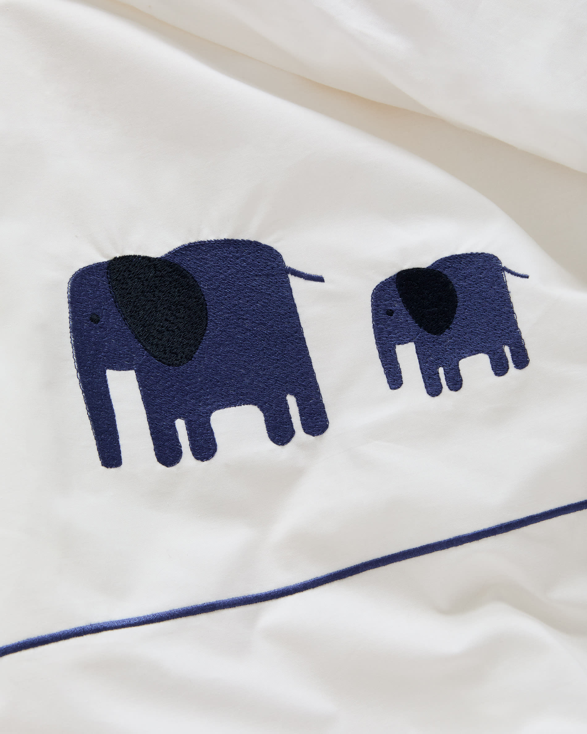 Tandari duvet cover and pillowcase set in beige cotton percale with embroidered elephant for 70cm bed