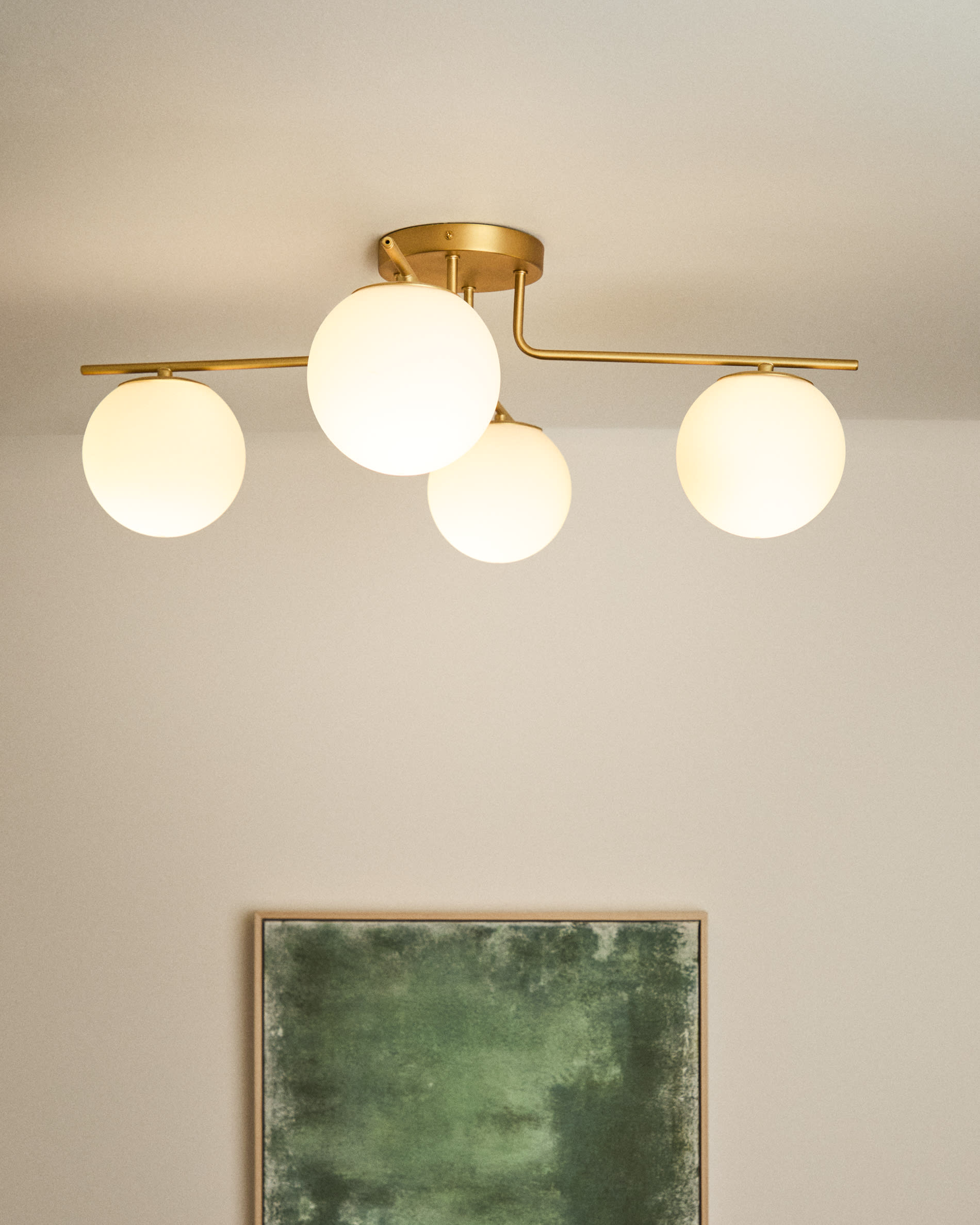 Brisia metal ceiling lamp with brushed brass finish and 4 frosted glass balls Ø15cm