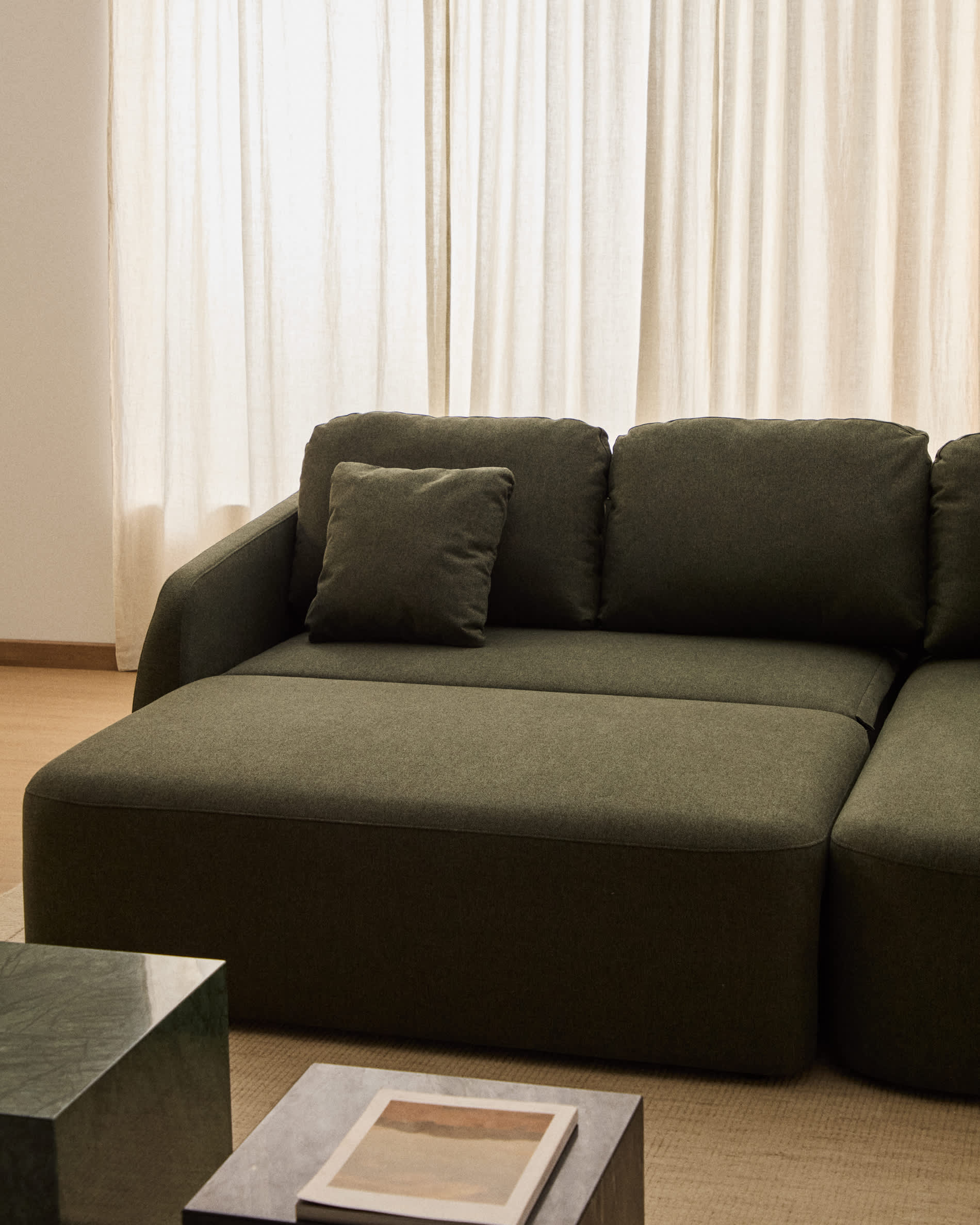 Laira 3-seater sofa bed with right chaise longue in dark green chenille 246cm FSC Mix Credit