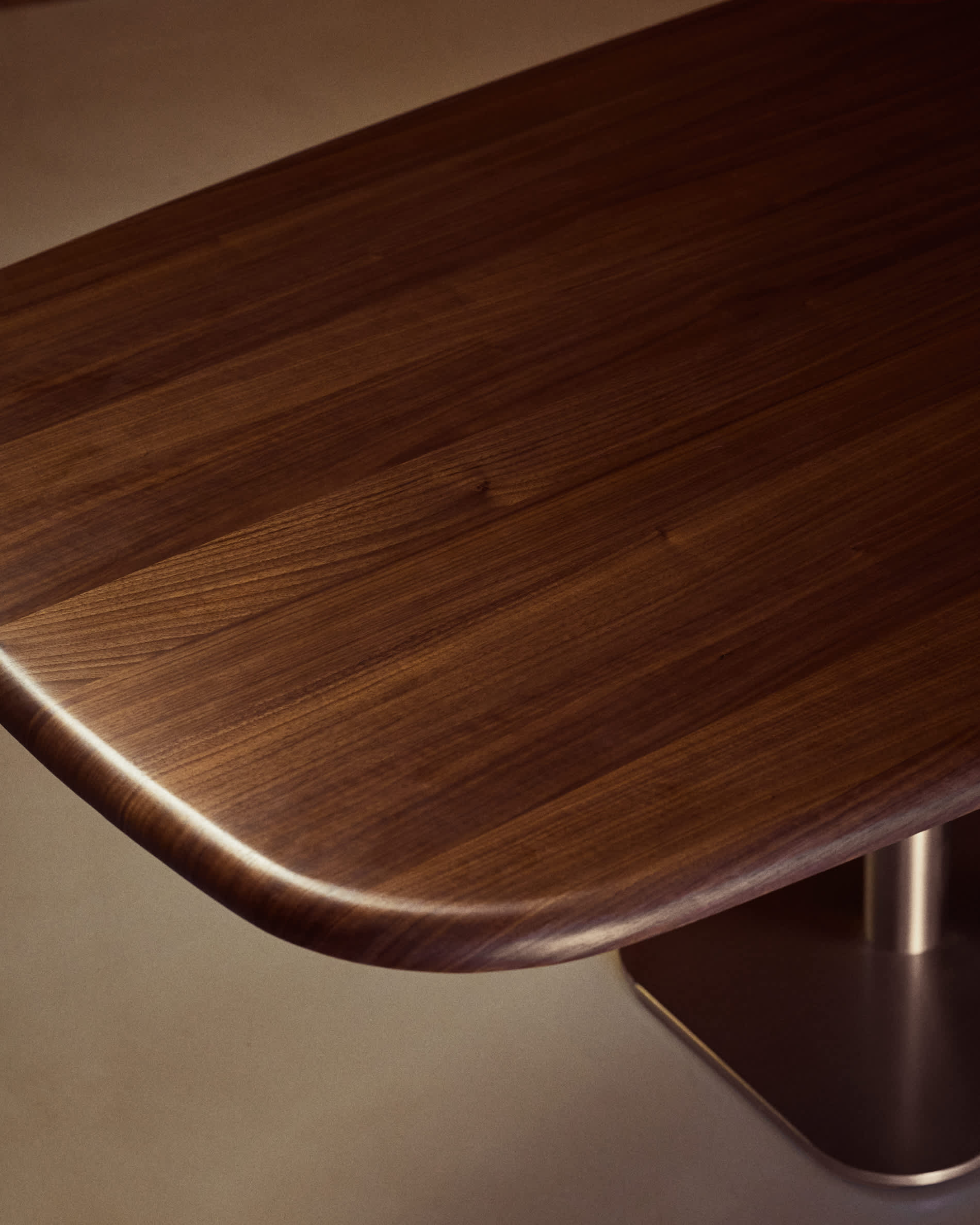 Melvar table made from walnut veneer and legs with brushed stainless steel base 180 x 100cm
