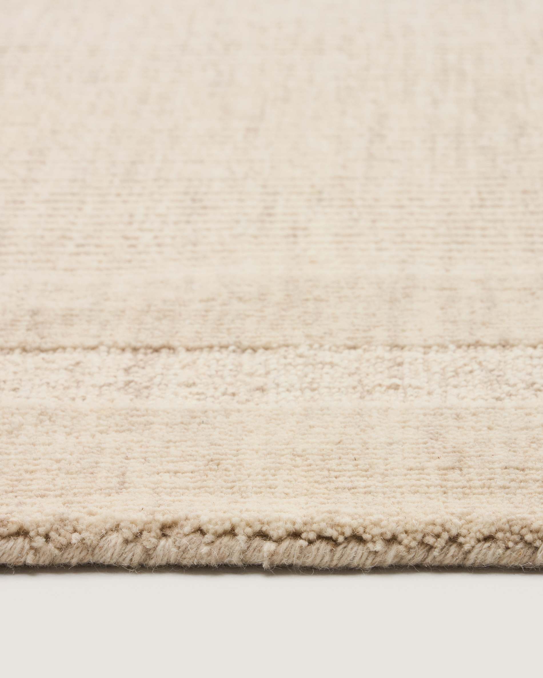 Dalena beige striped jacquard wool rug 230 x 160cm