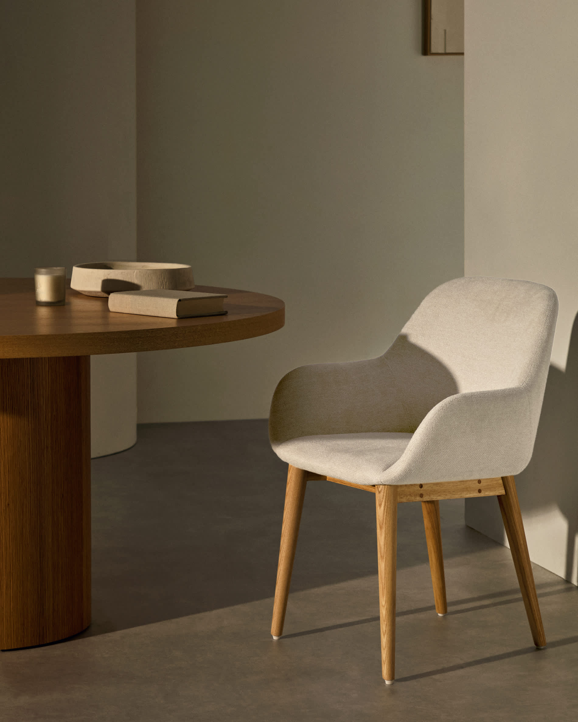 Konna chair in beige with solid ash wood legs in a natural finish