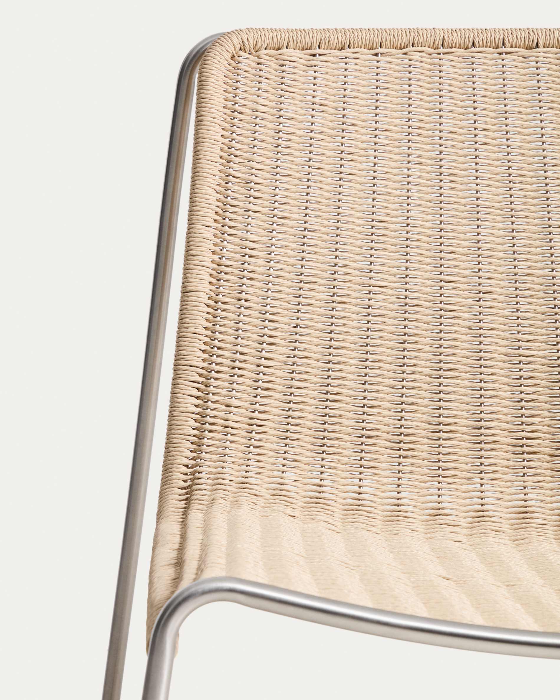Tavari stackable armchair in beige synthetic rope cord and AISI 304 stainless steel with brushed finish