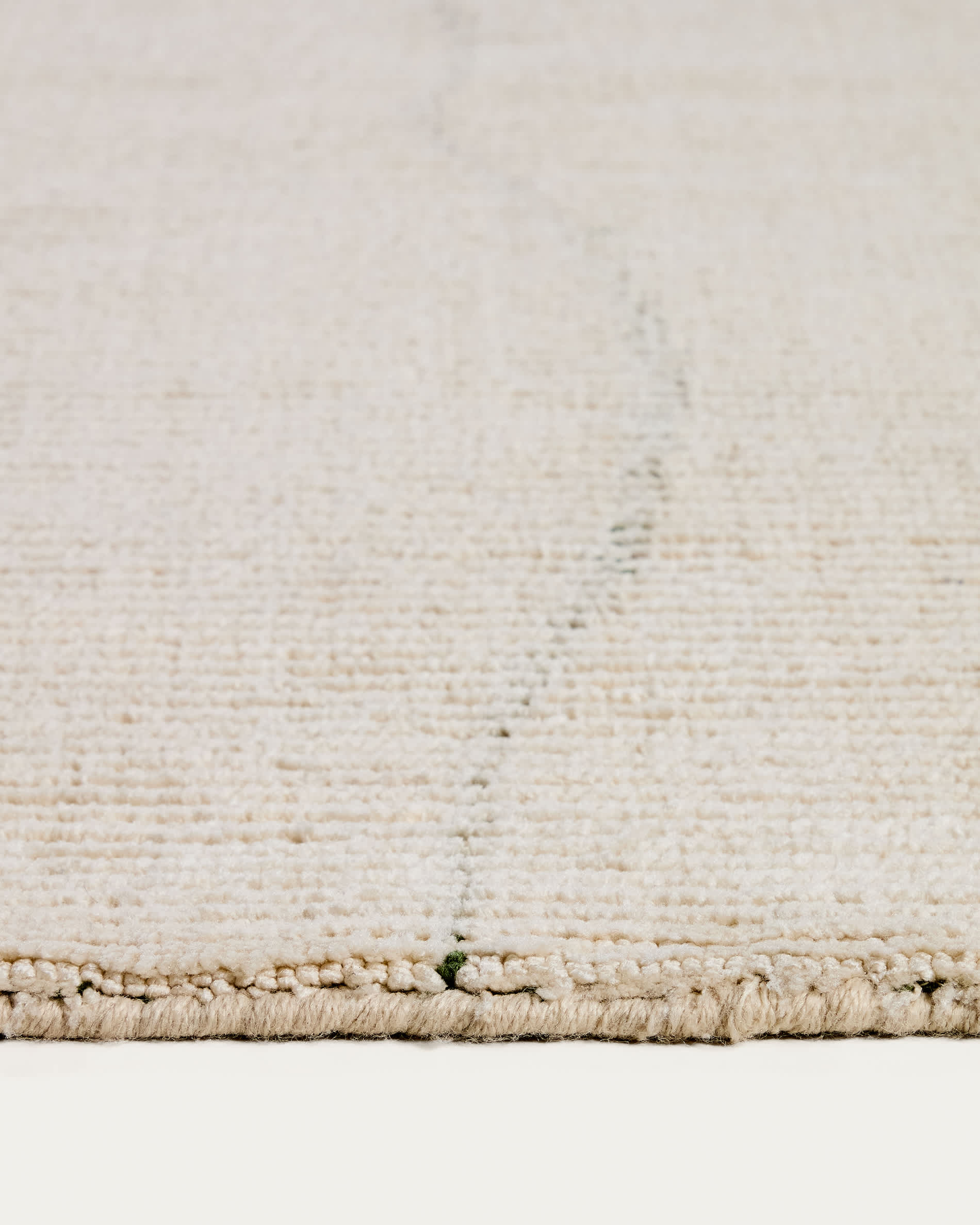 Lisdan ecru synthetic fibre rug with green graphic detail 160 x 230cm