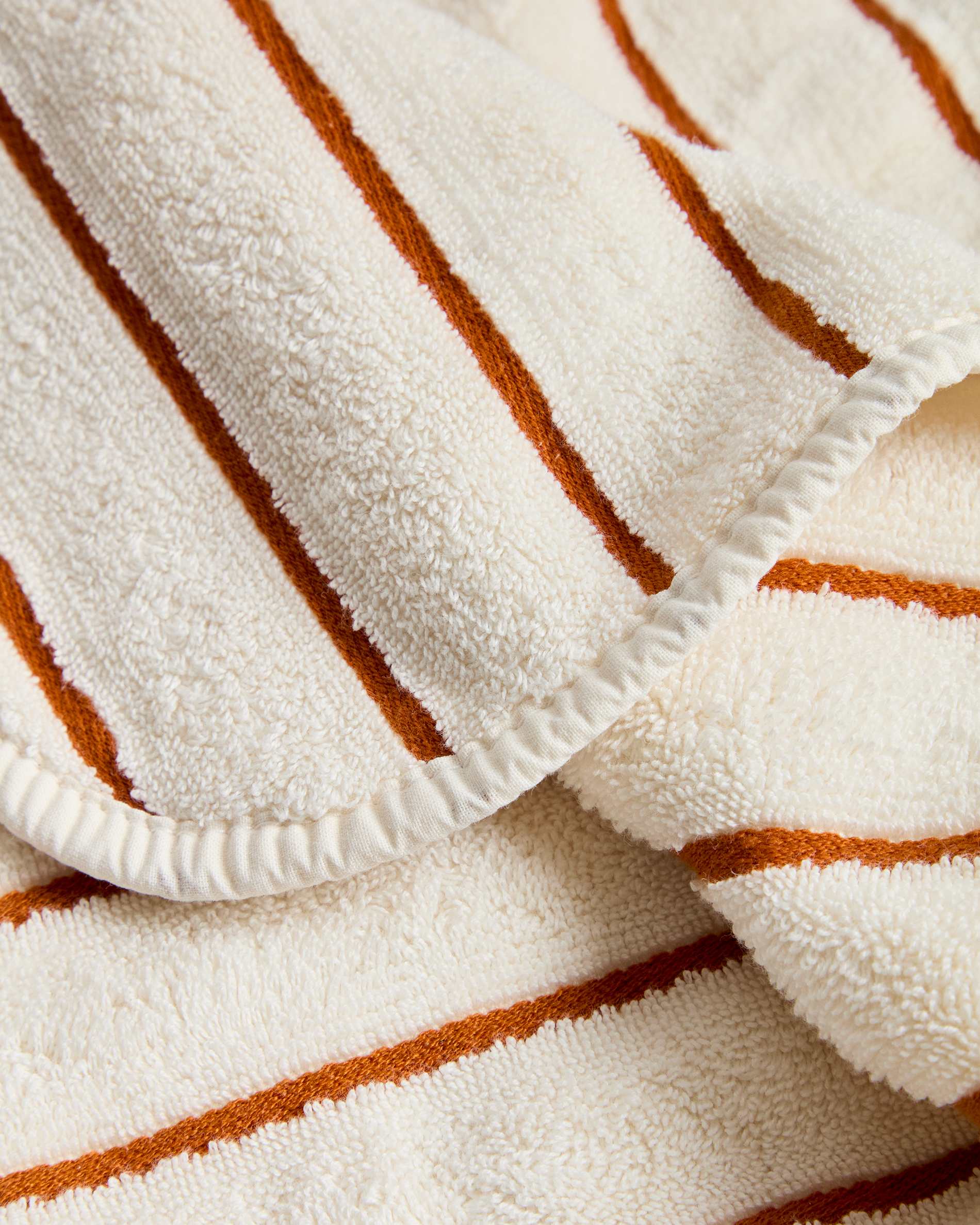Dorane 100% cotton hand towel with orange stripes 30 x 50cm