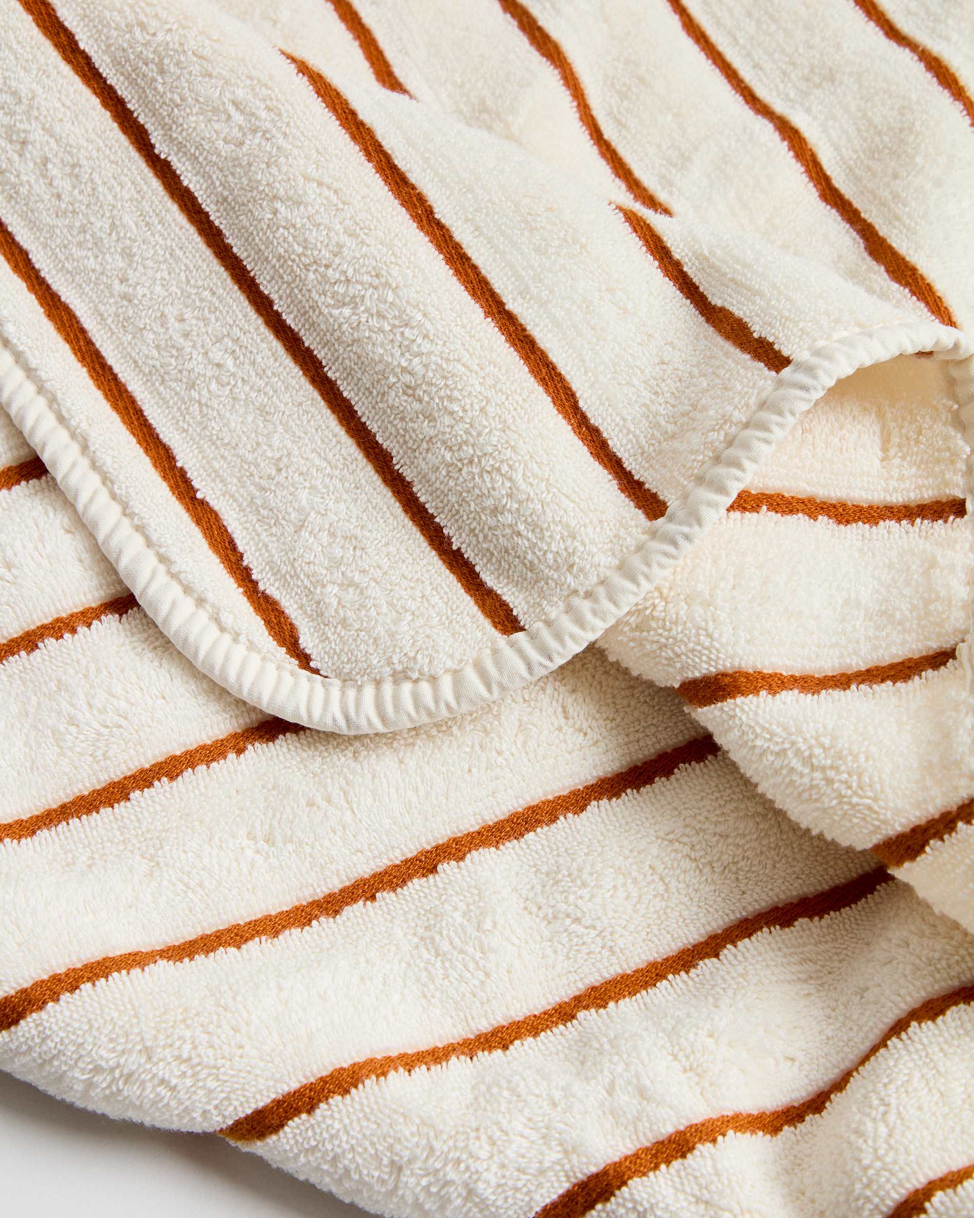 Dorane 100% cotton hand towel with orange stripes 50 x 90cm
