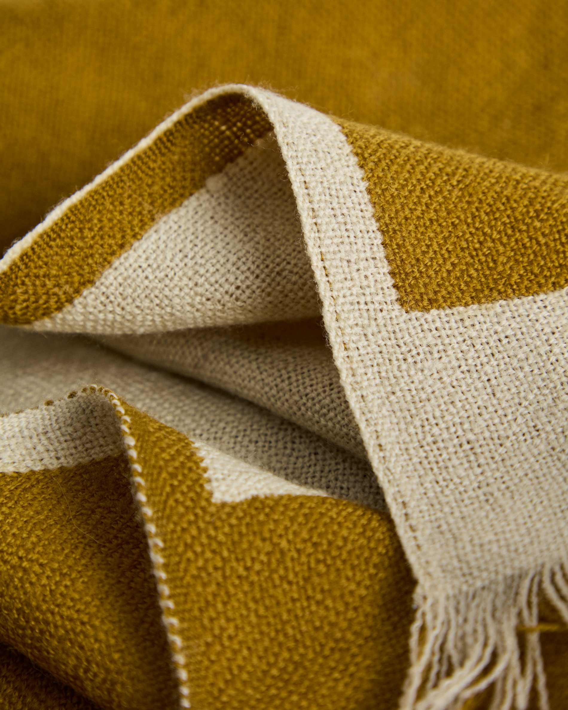 Orlet reversible wool blanket in mustard and beige 130 x 170 cm