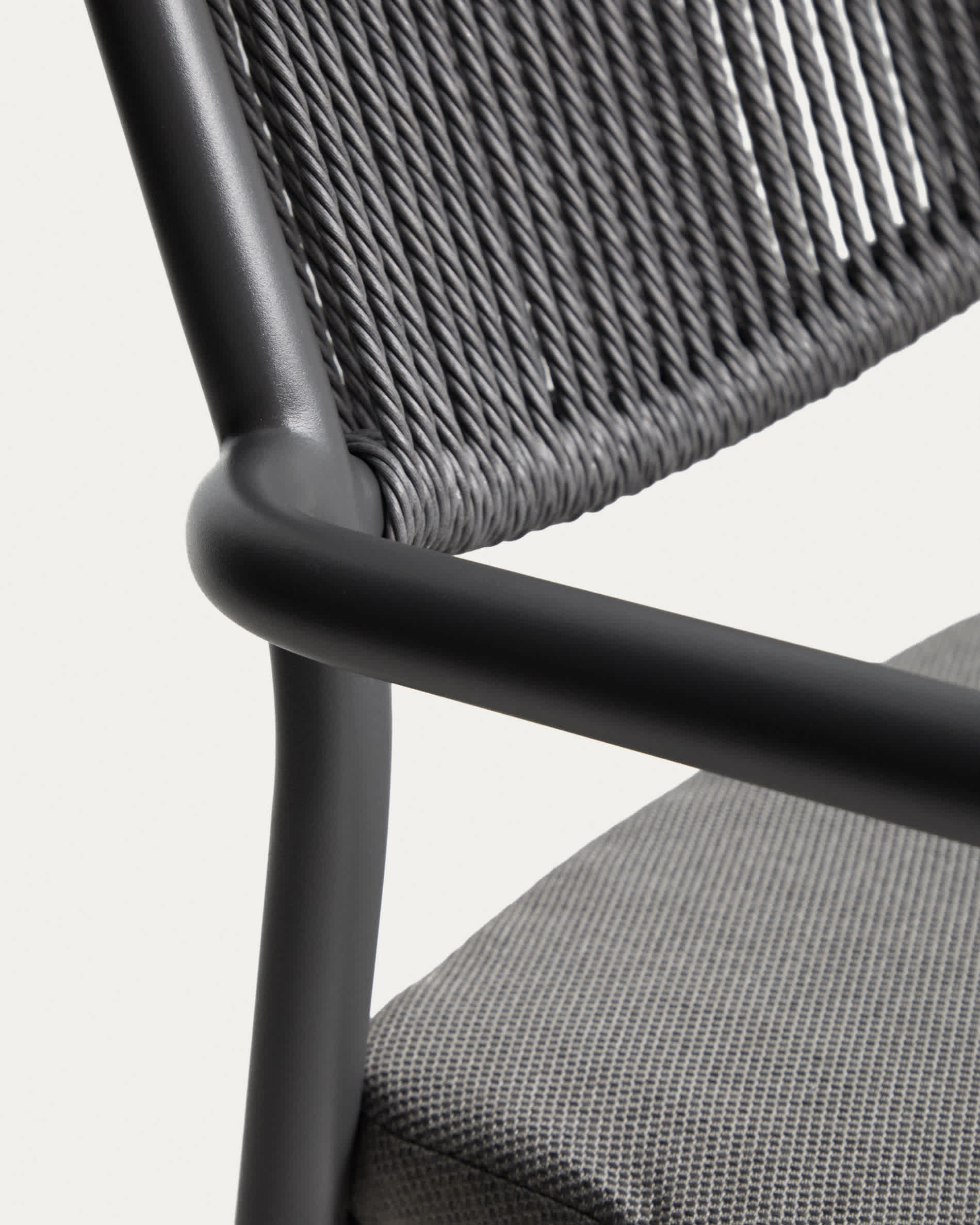Argasi stackable outdoor chair in graphite aluminium and dark grey synthetic rope cord