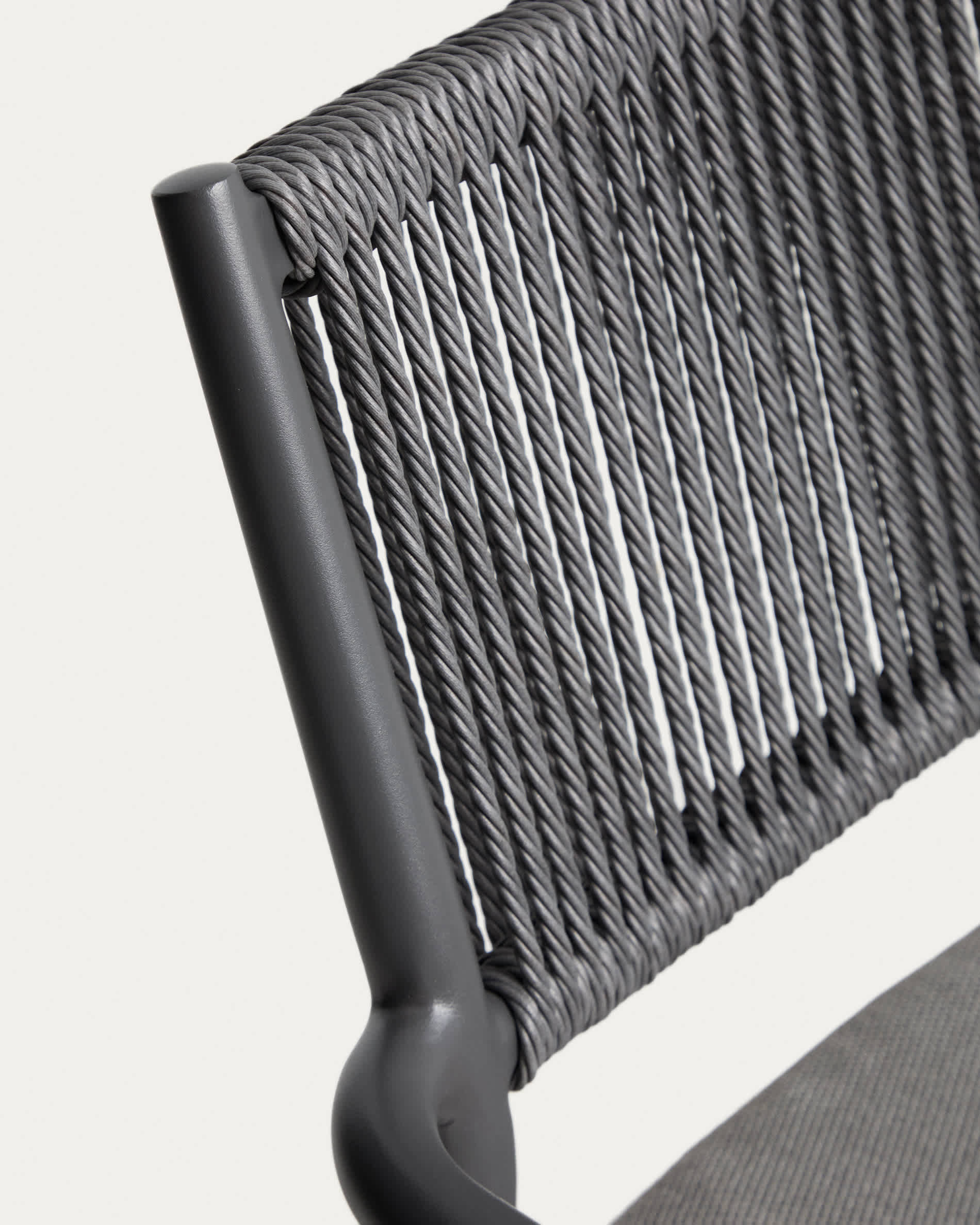 Argasi stackable outdoor chair in graphite aluminium and dark grey synthetic rope cord