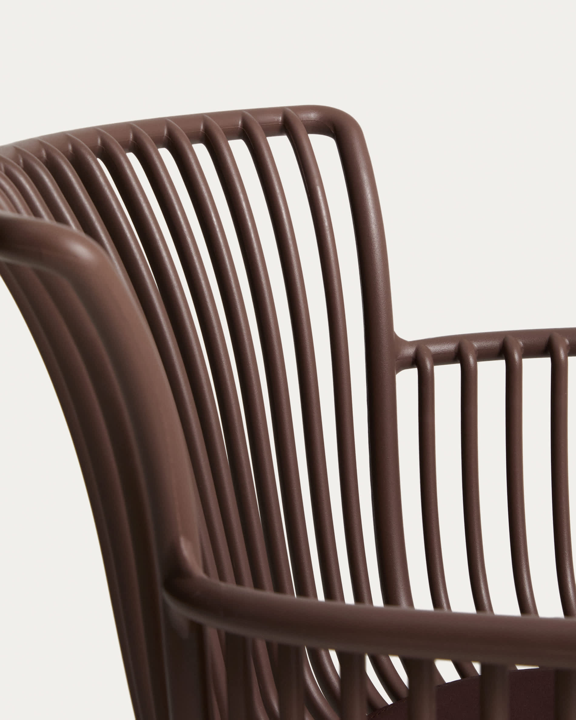 Surpika outdoor chair with brown steel legs