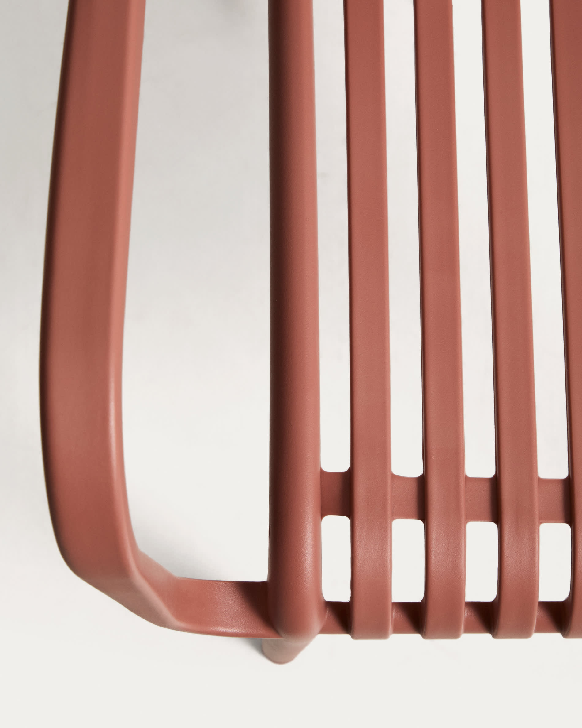 Isabellini stackable outdoor chair in terracotta