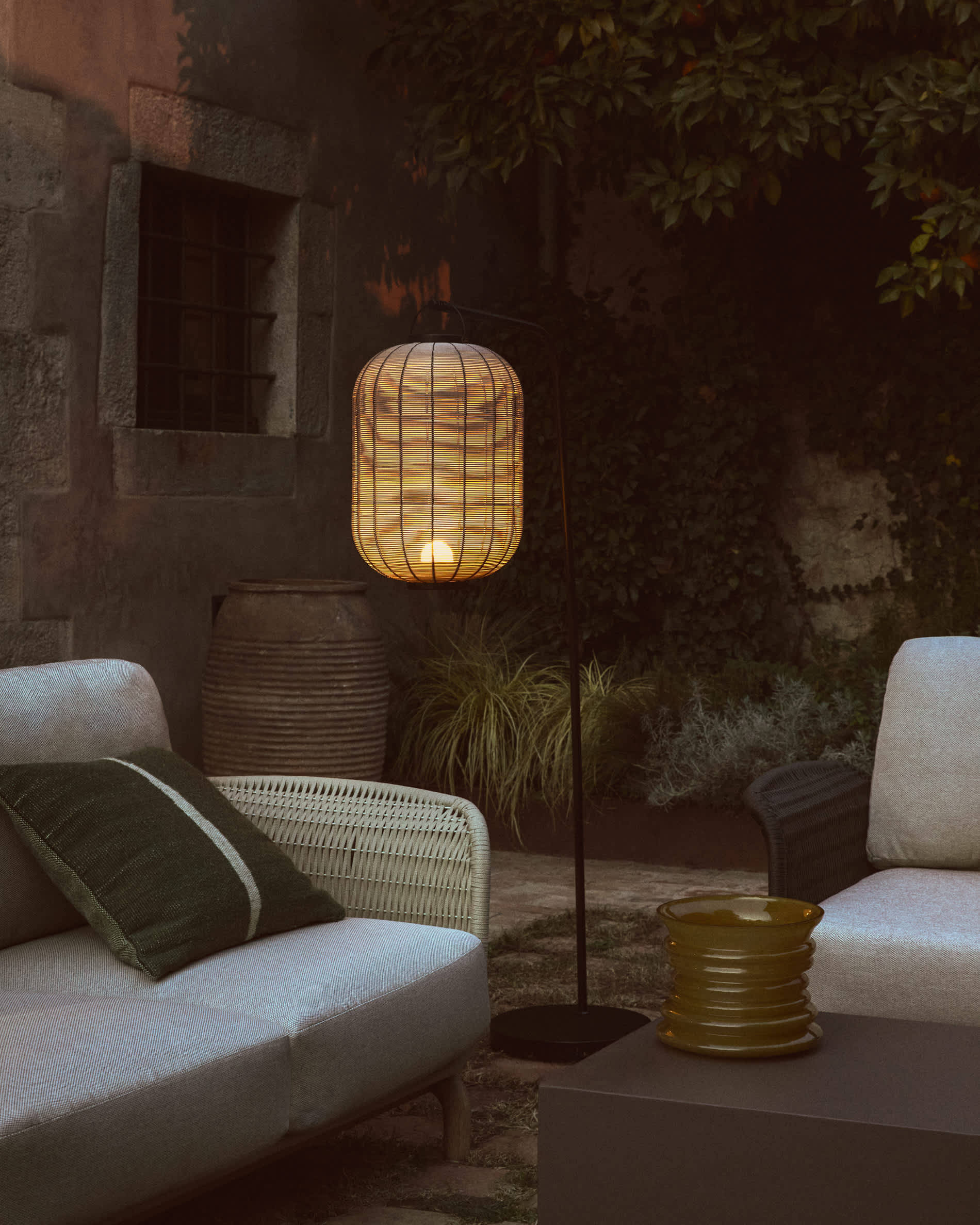Saranella portable LED table lamp in light grey synthetic rattan