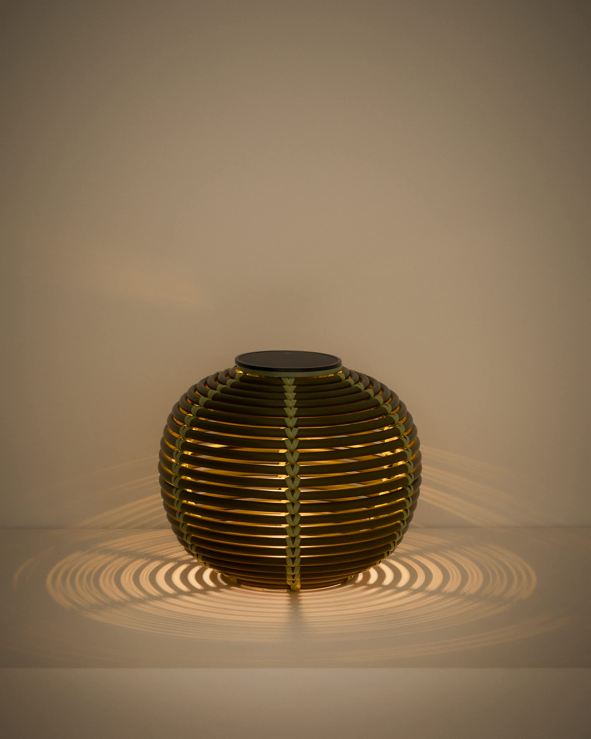 Garoina outdoor solar LED table lamp in green synthetic rattan Ø25cm