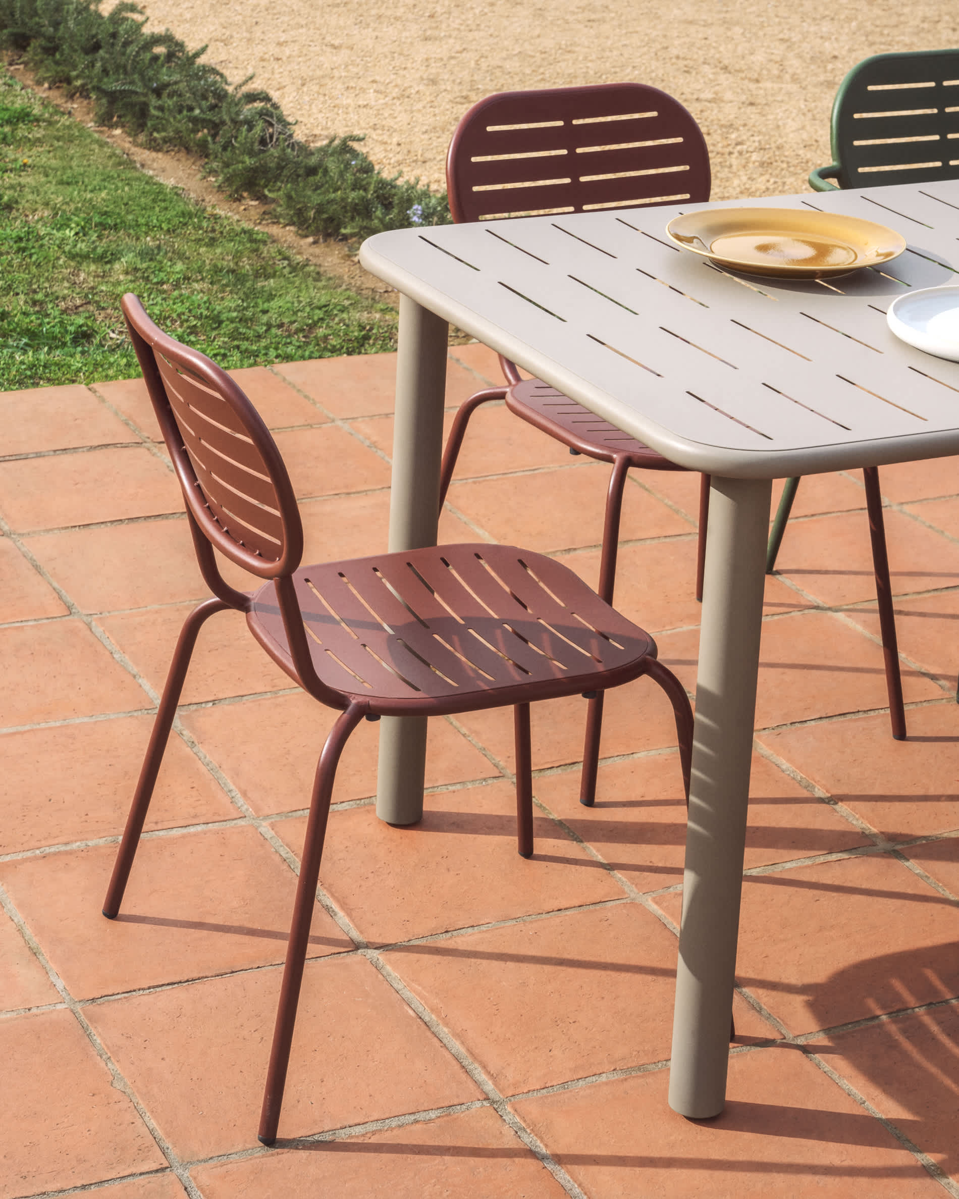Brai stackable outdoor chair in burgundy galvanised steel
