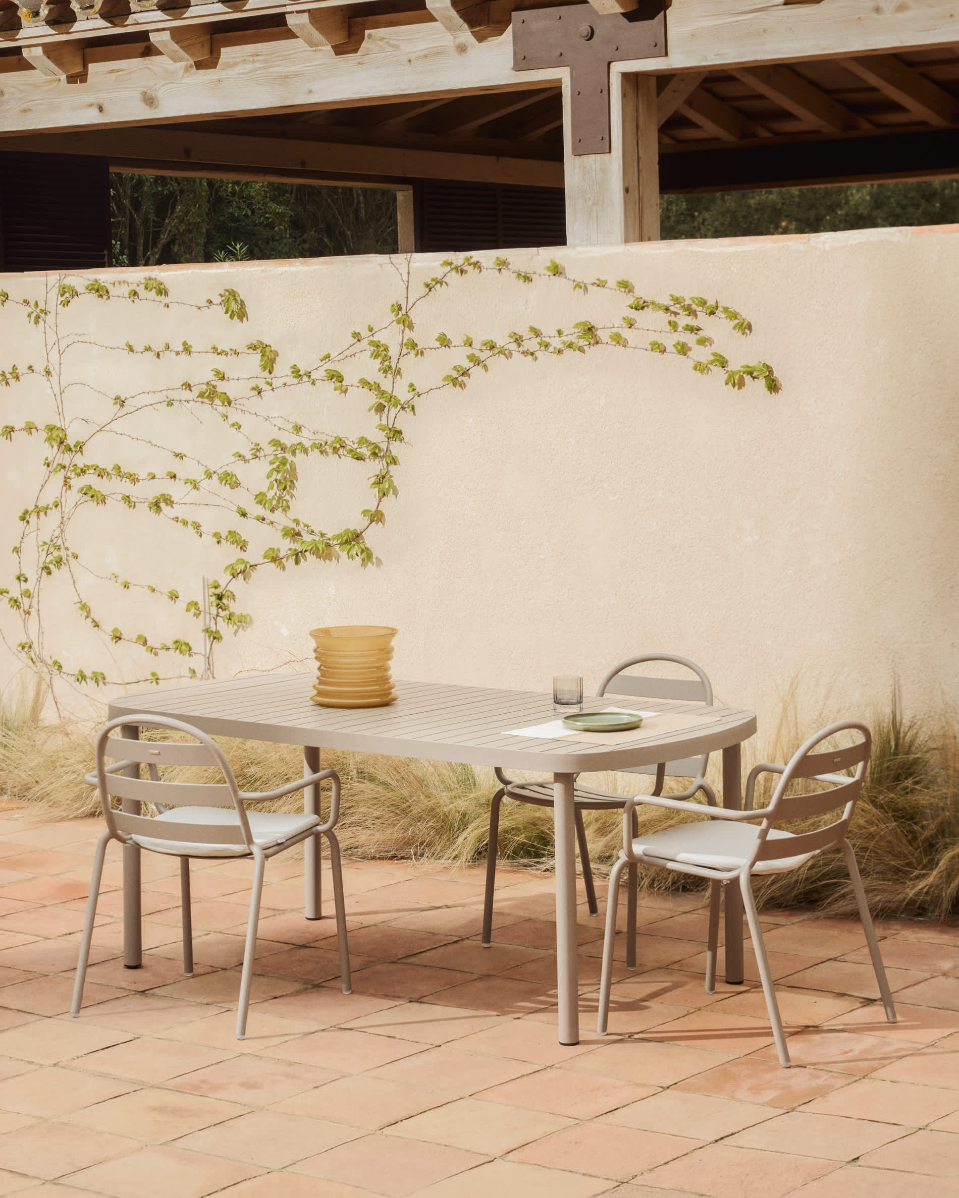 Joncols stackable outdoor chair in aluminium with taupe painted finish
