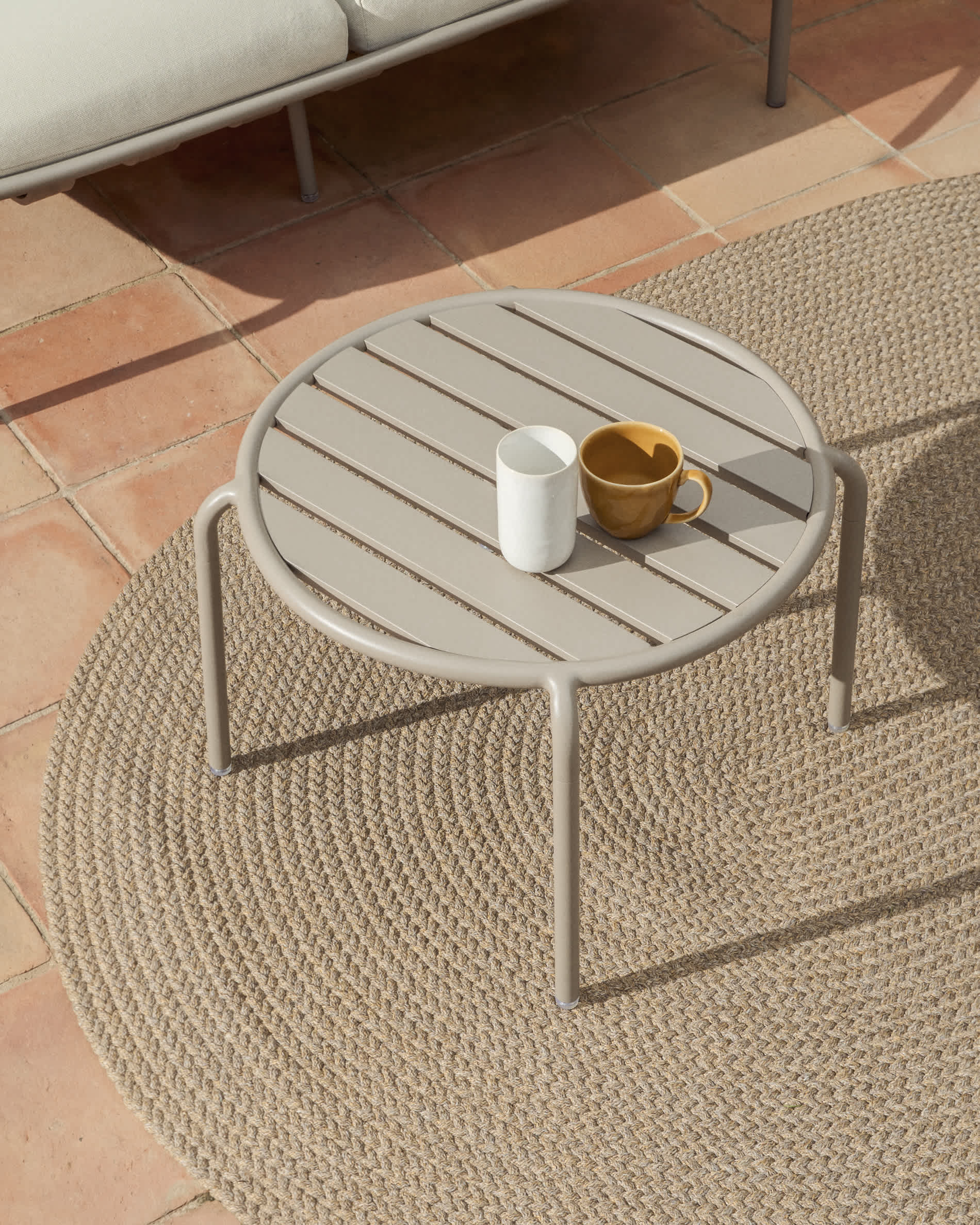 Joncols outdoor side table in aluminium with taupe painted finish Ø 60cm