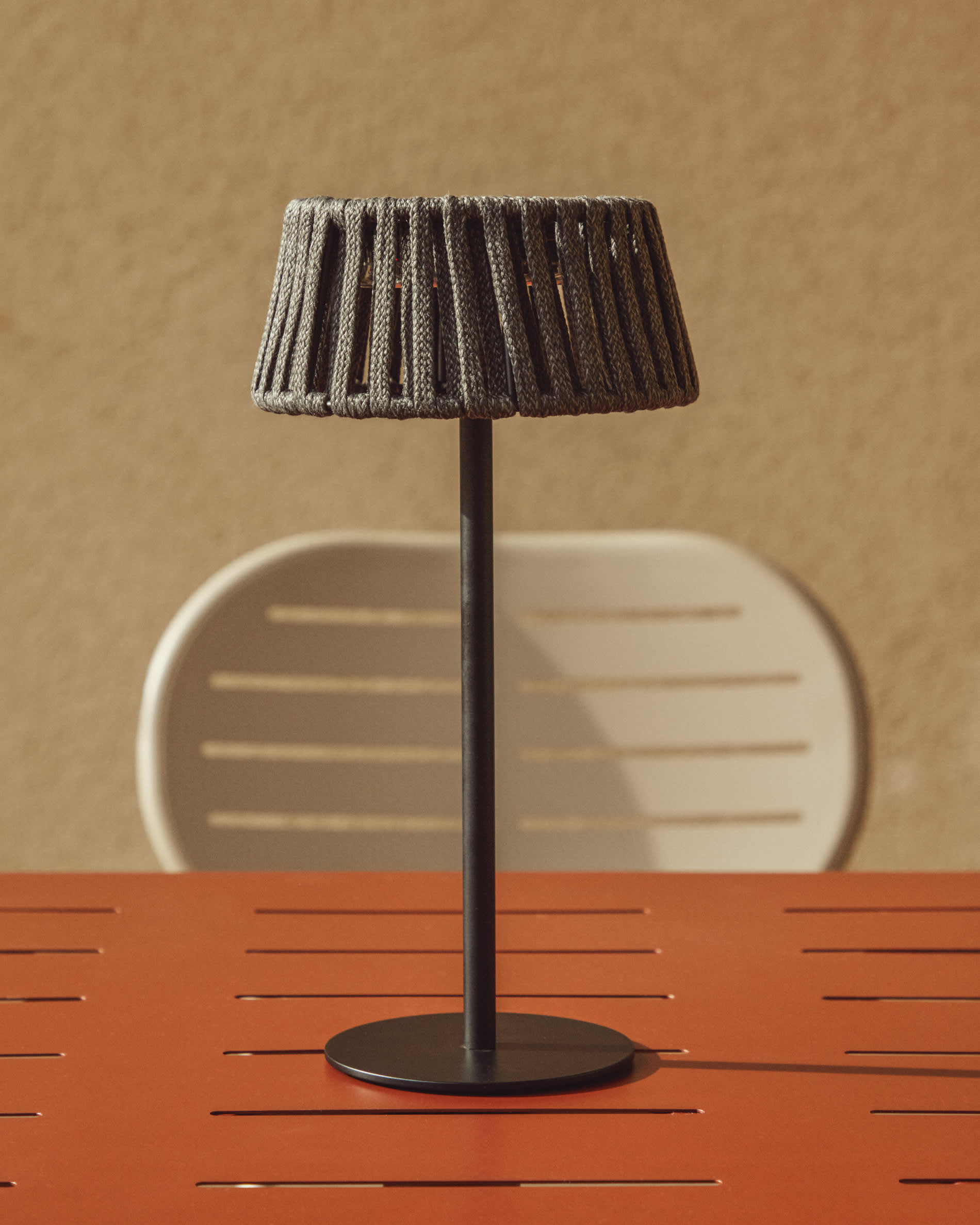 Aldet outdoor solar table lamp in black flat rope cord with metal stand