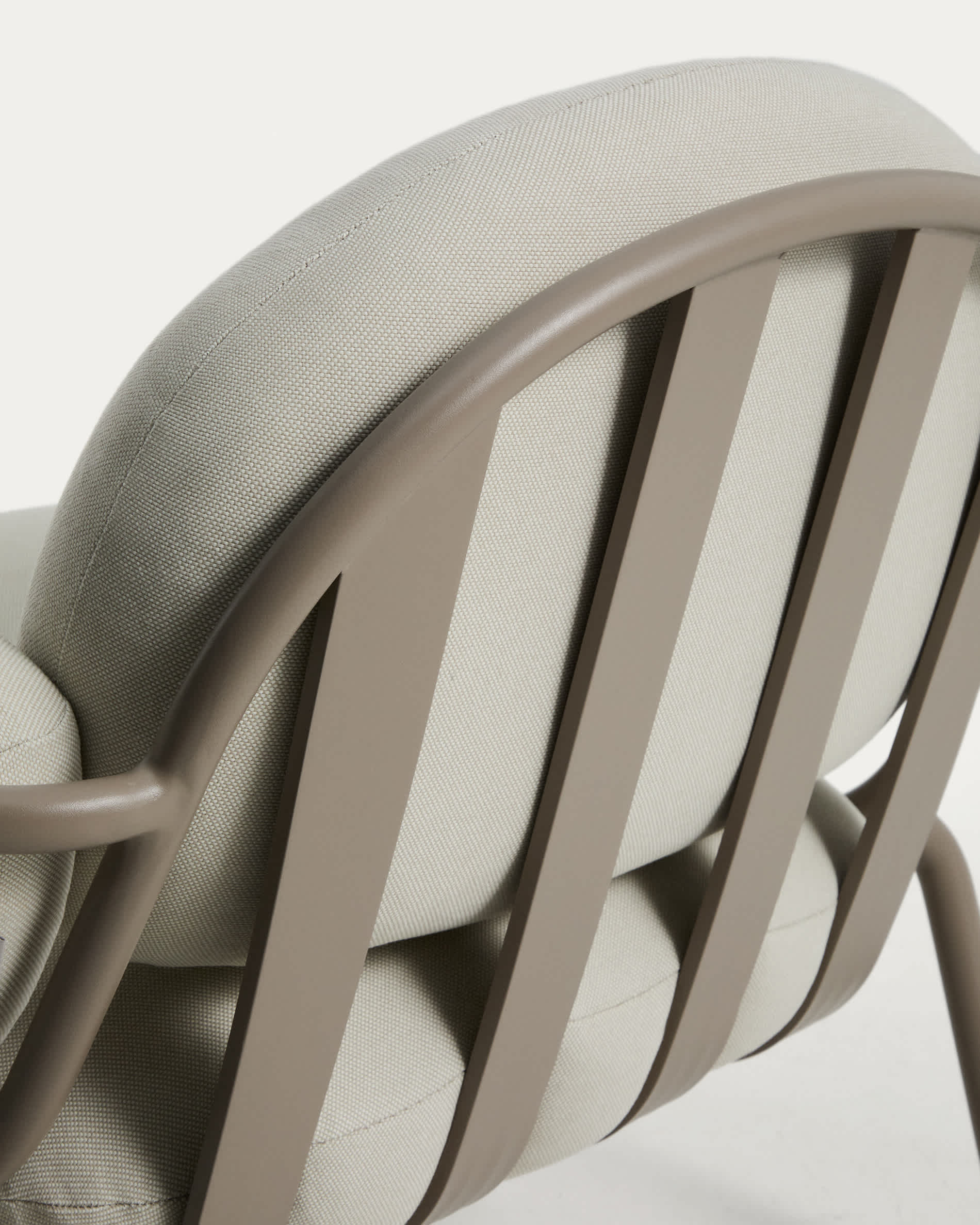 Joncols outdoor armchair in aluminium with taupe painted finish and beige cushions