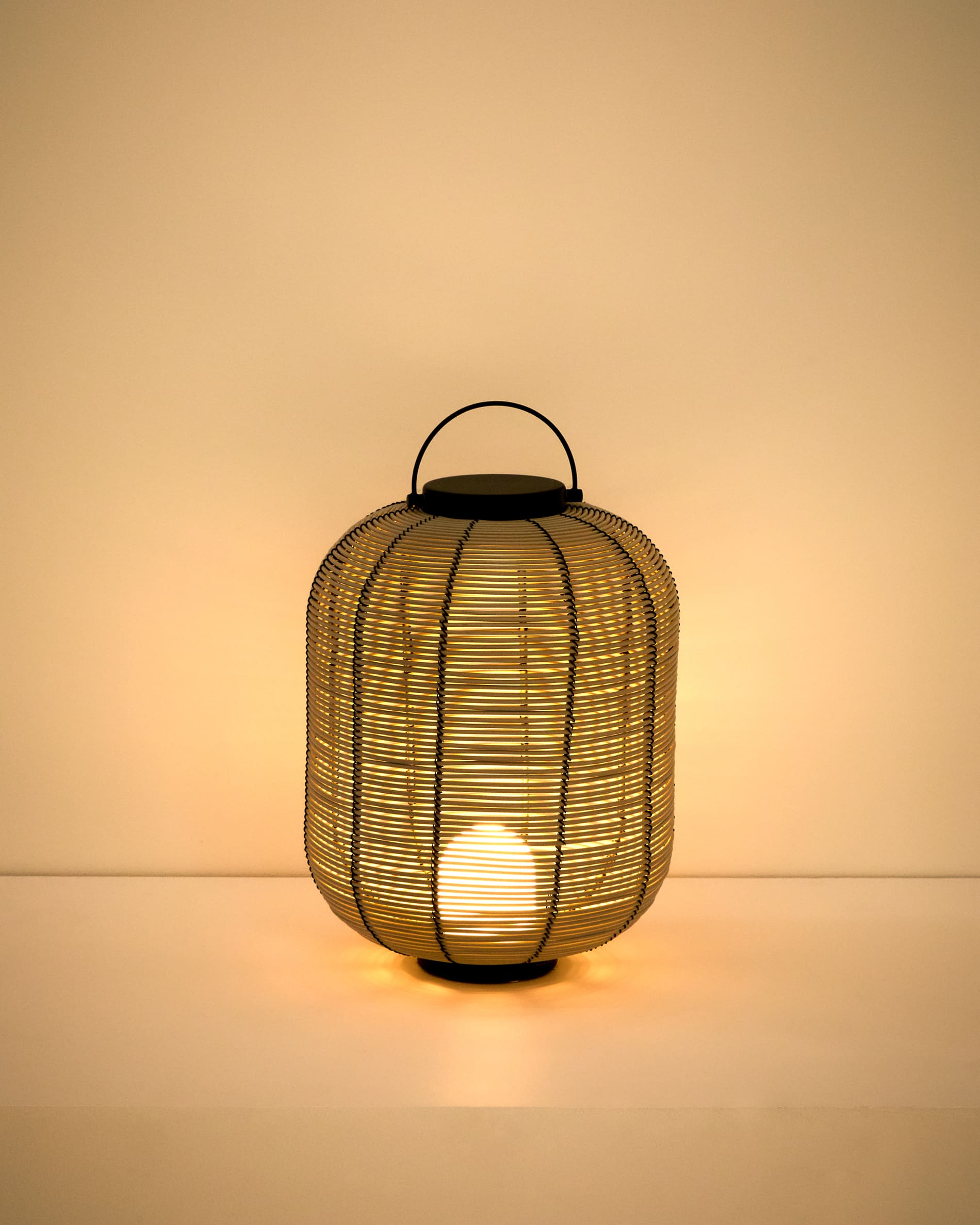 Saranella small portable LED table lamp in light grey synthetic rattan