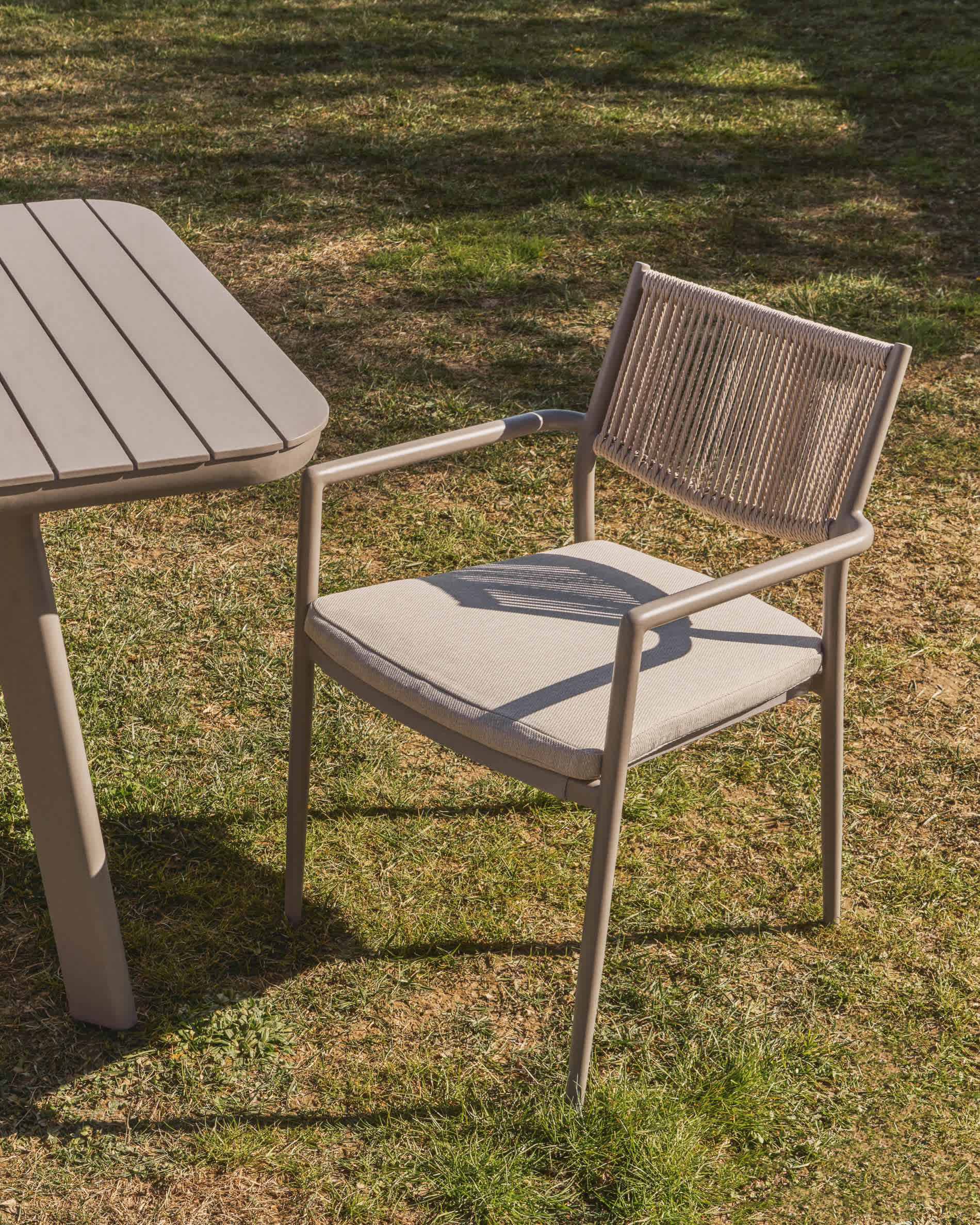 Argasi stackable outdoor chair in taupe aluminium and beige synthetic rope cord