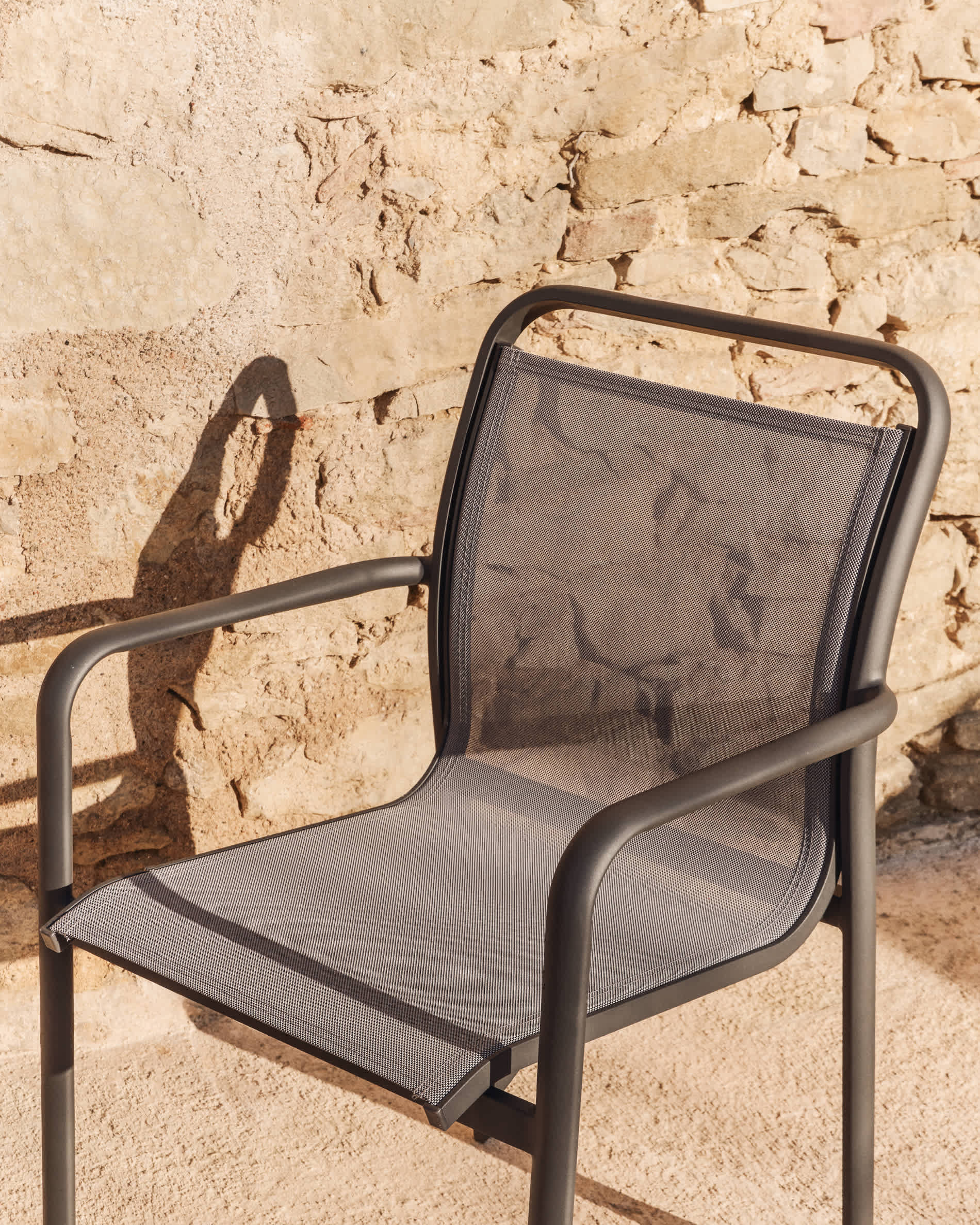 Luri stackable outdoor chair in graphite aluminium and grey texteline