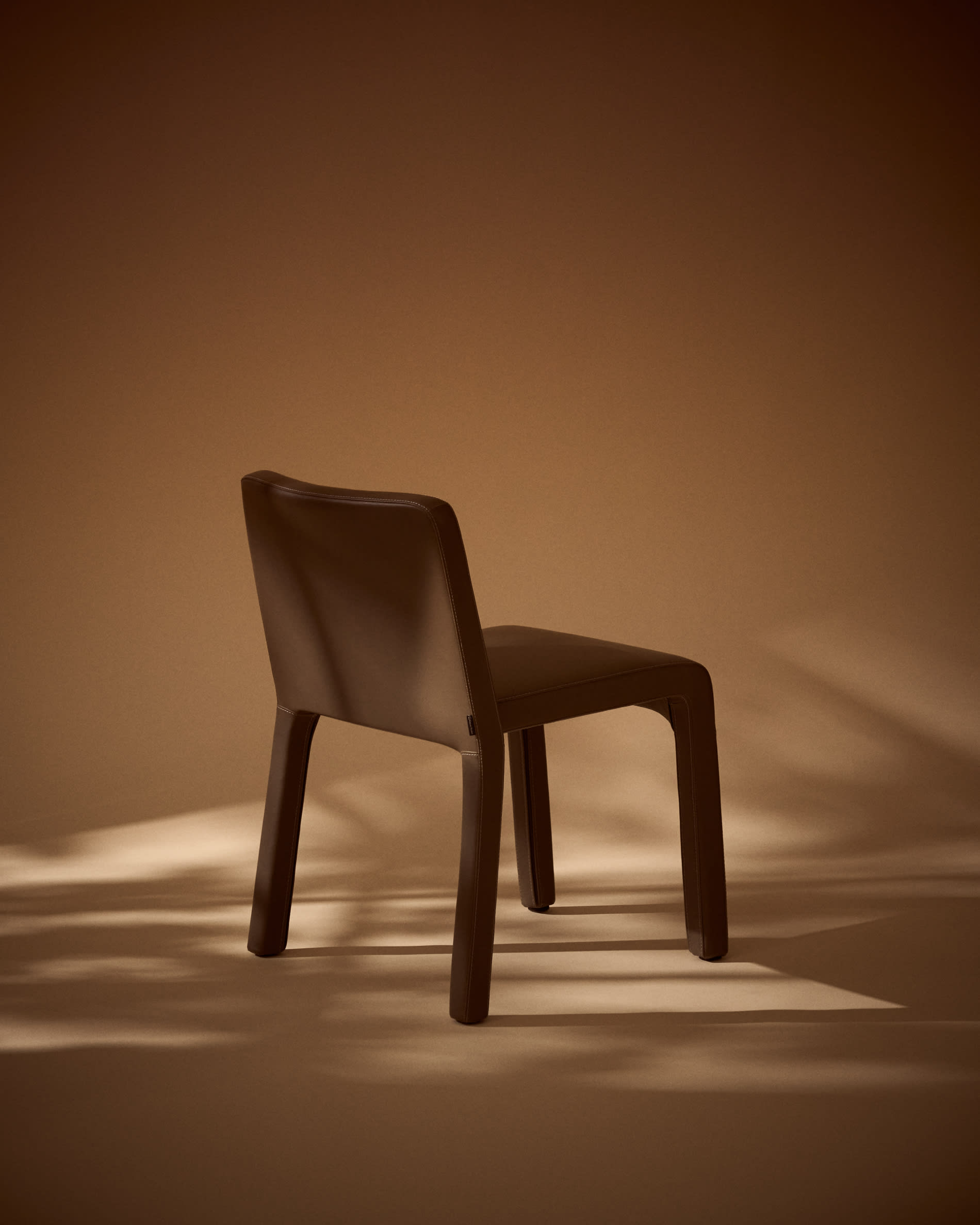 Loria stackable chair in brown polyurethane FSC 100%