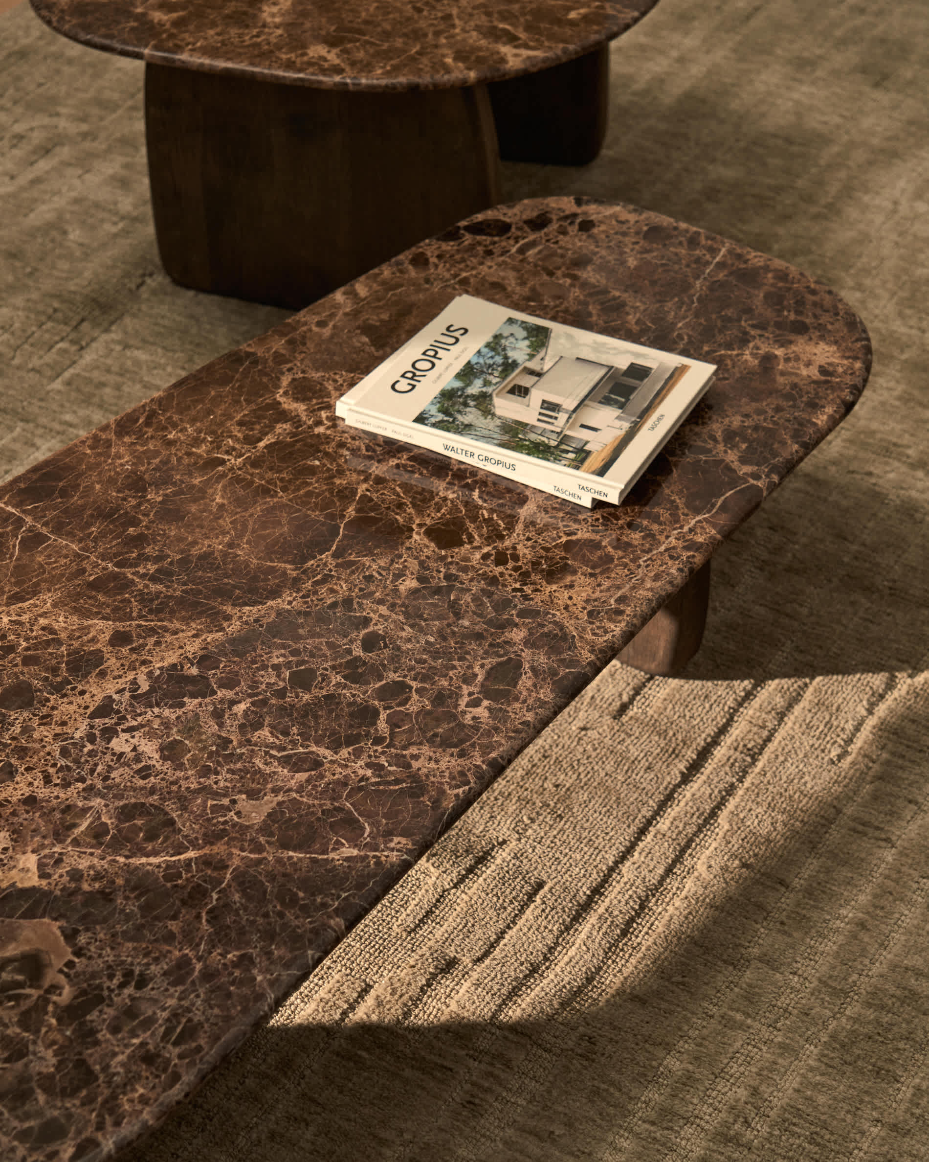 Pirita coffee table in brown marble with solid oak wood legs with a dark finish 147 x 65cm FSC 100%