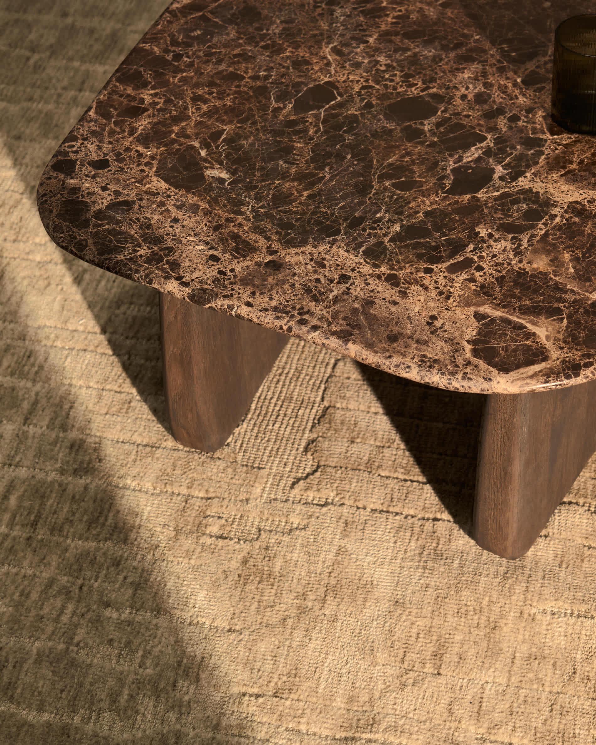 Pirita side table in brown marble with solid oak wood legs with a dark finish 71 x 70cm FSC 100%