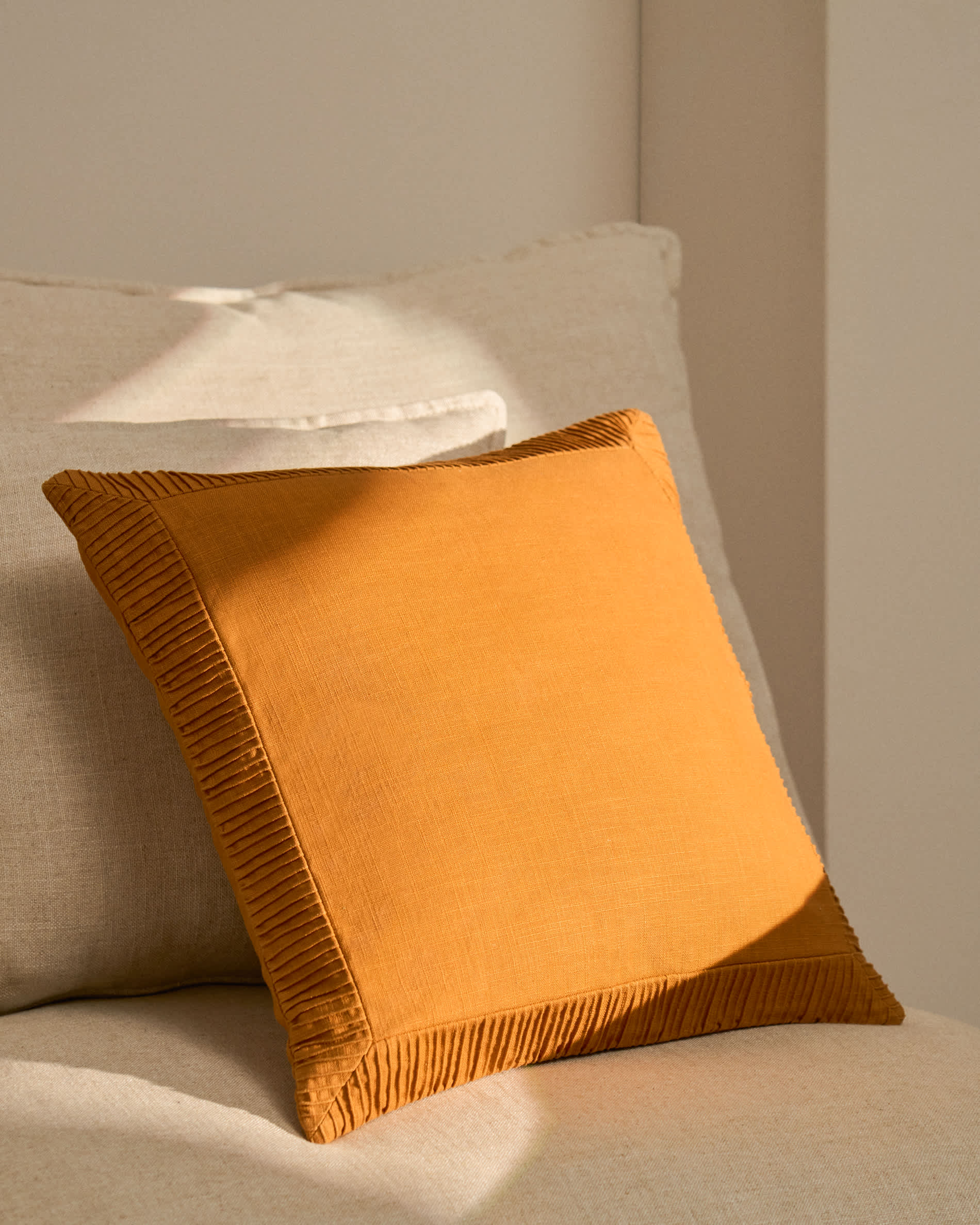 Luadia cotton cushion cover with orange pleated detail 50 x 50cm
