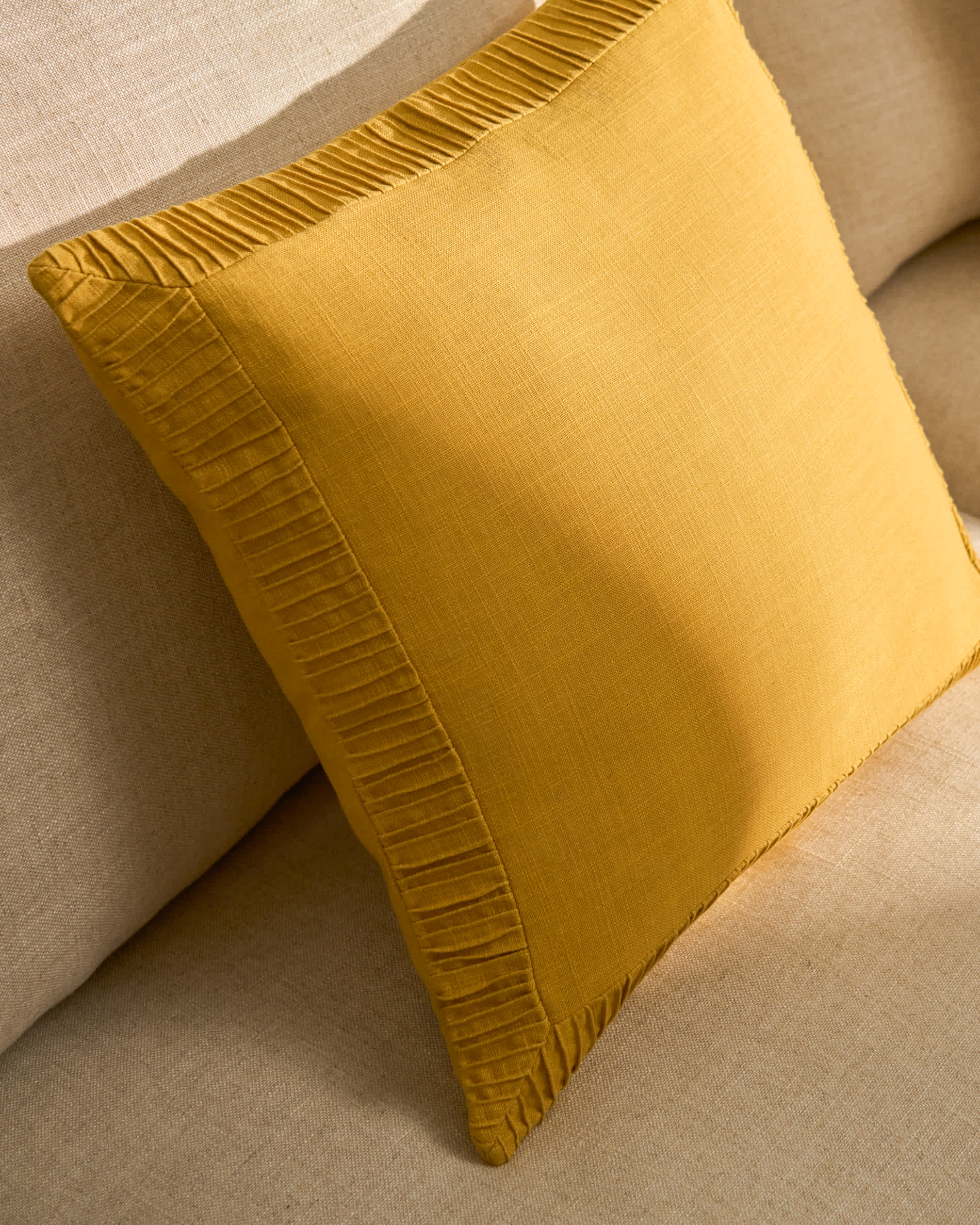 Luadia cotton cushion cover with yellow pleated detail 50 x 50cm