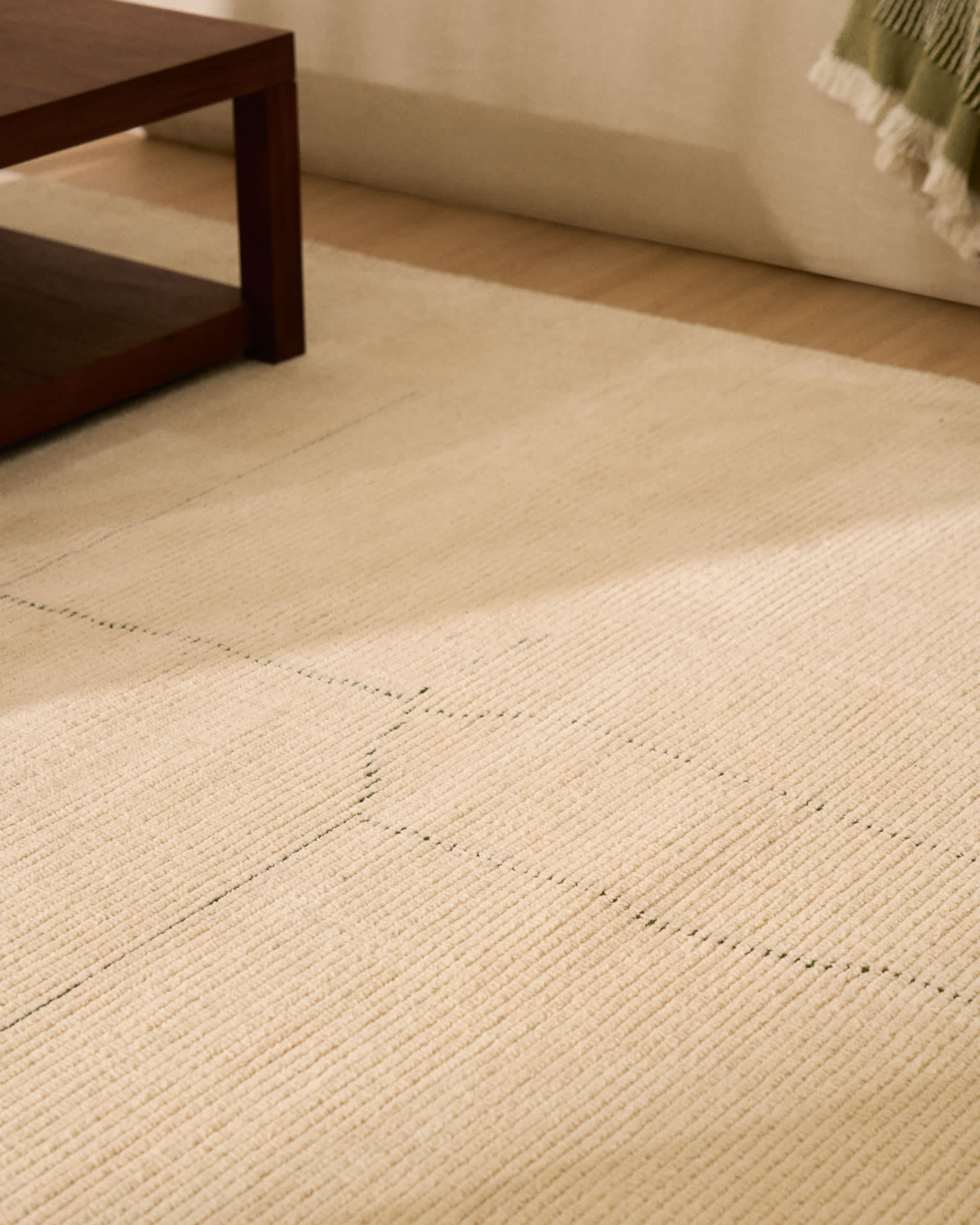Lisdan ecru synthetic fibre rug with green graphic detail 160 x 230cm