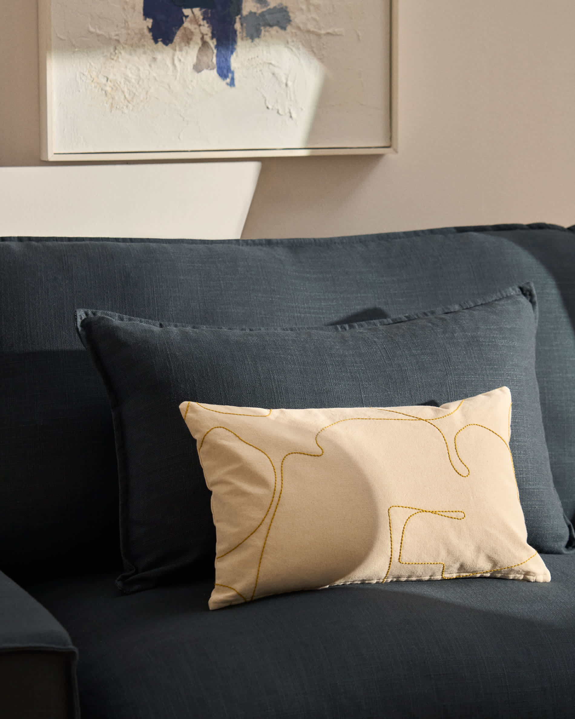 Dibel ecru cotton cushion cover with yellow embroidery detail 30 x 50cm