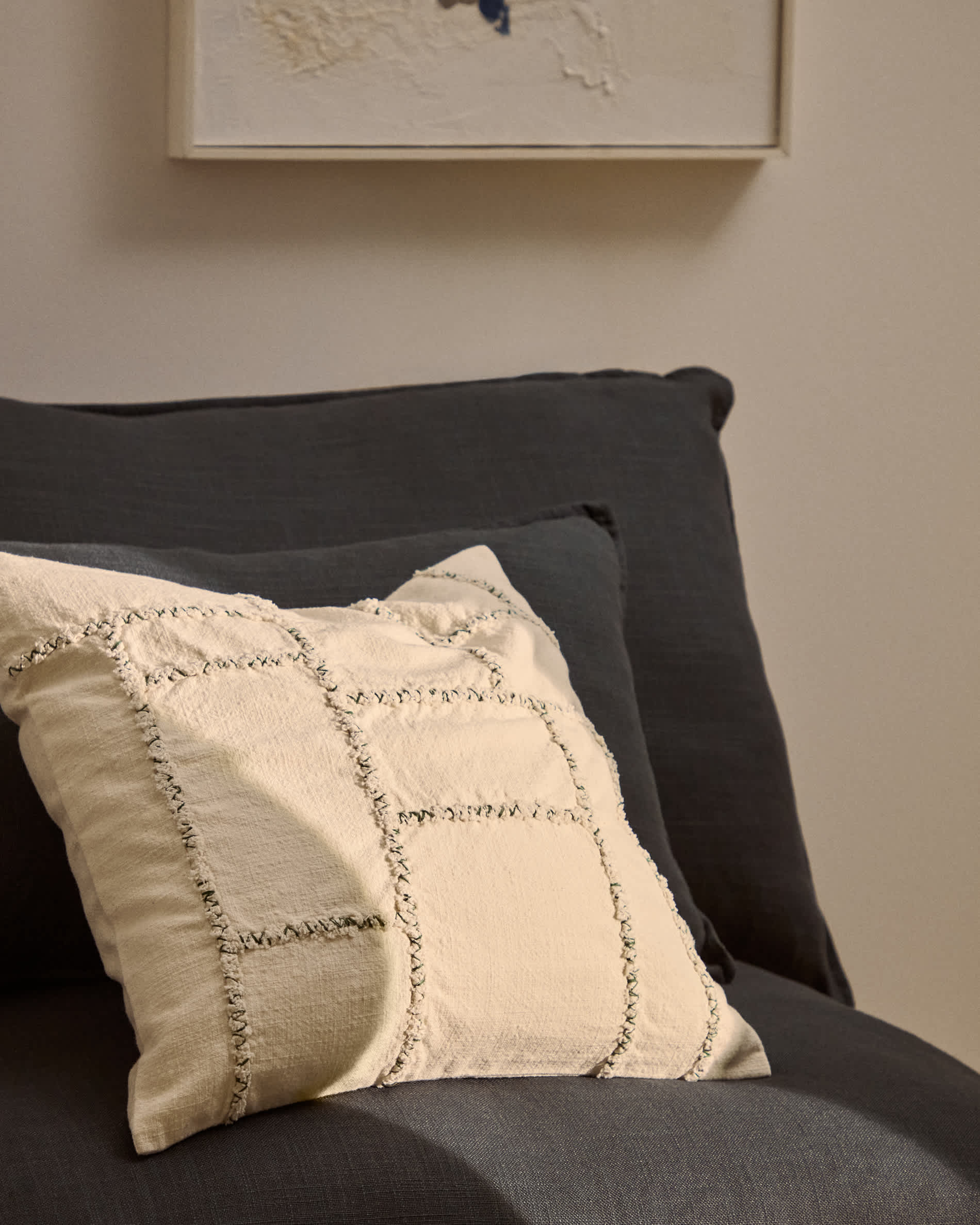 Verion green cushion cover with embroidered geometric detail 45 x 45cm
