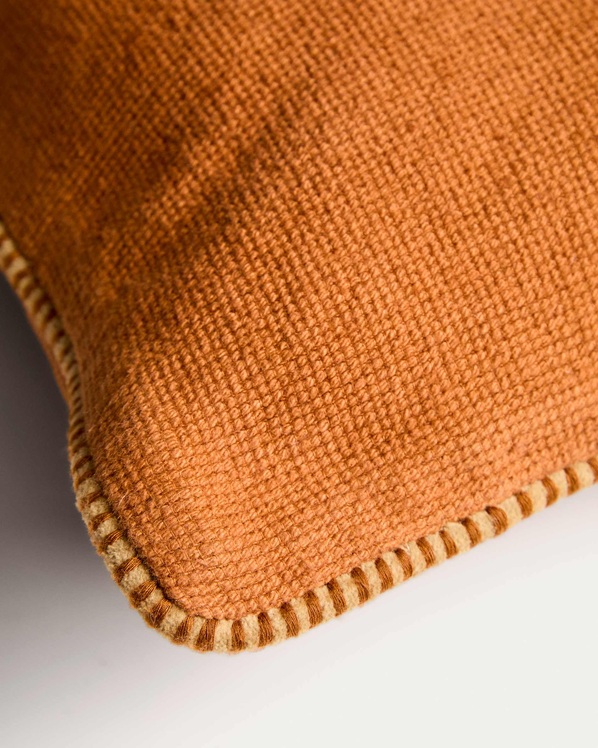Lunor cushion cover with orange embroidered contrast piping 45 x 45 cm