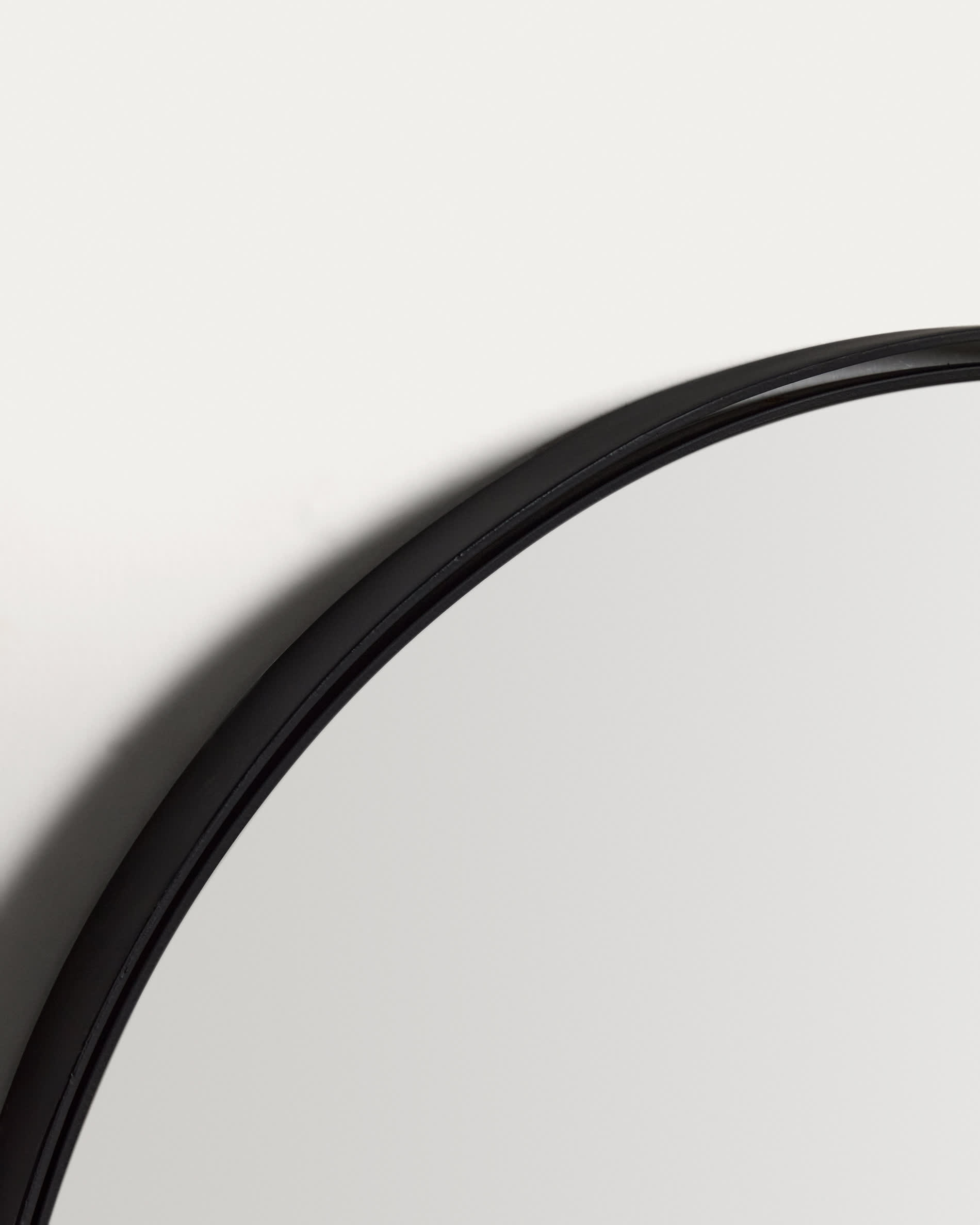 Noral oval black metal mirror Ø60.5 x 120cm