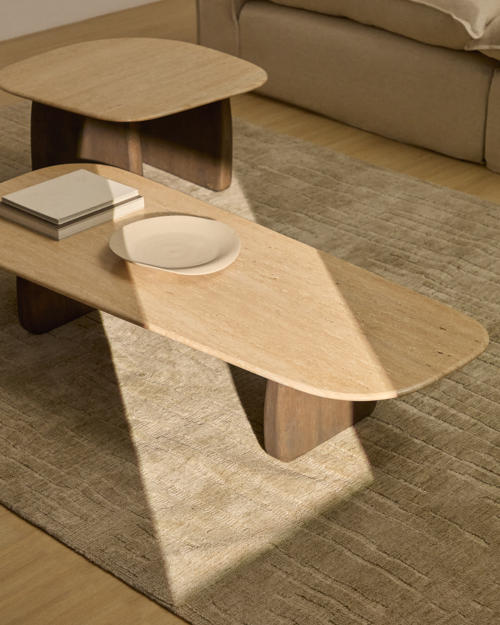Pirita coffee table in beige travertine with solid oak wood legs with a dark finish 147 x 65cm FSC 100%