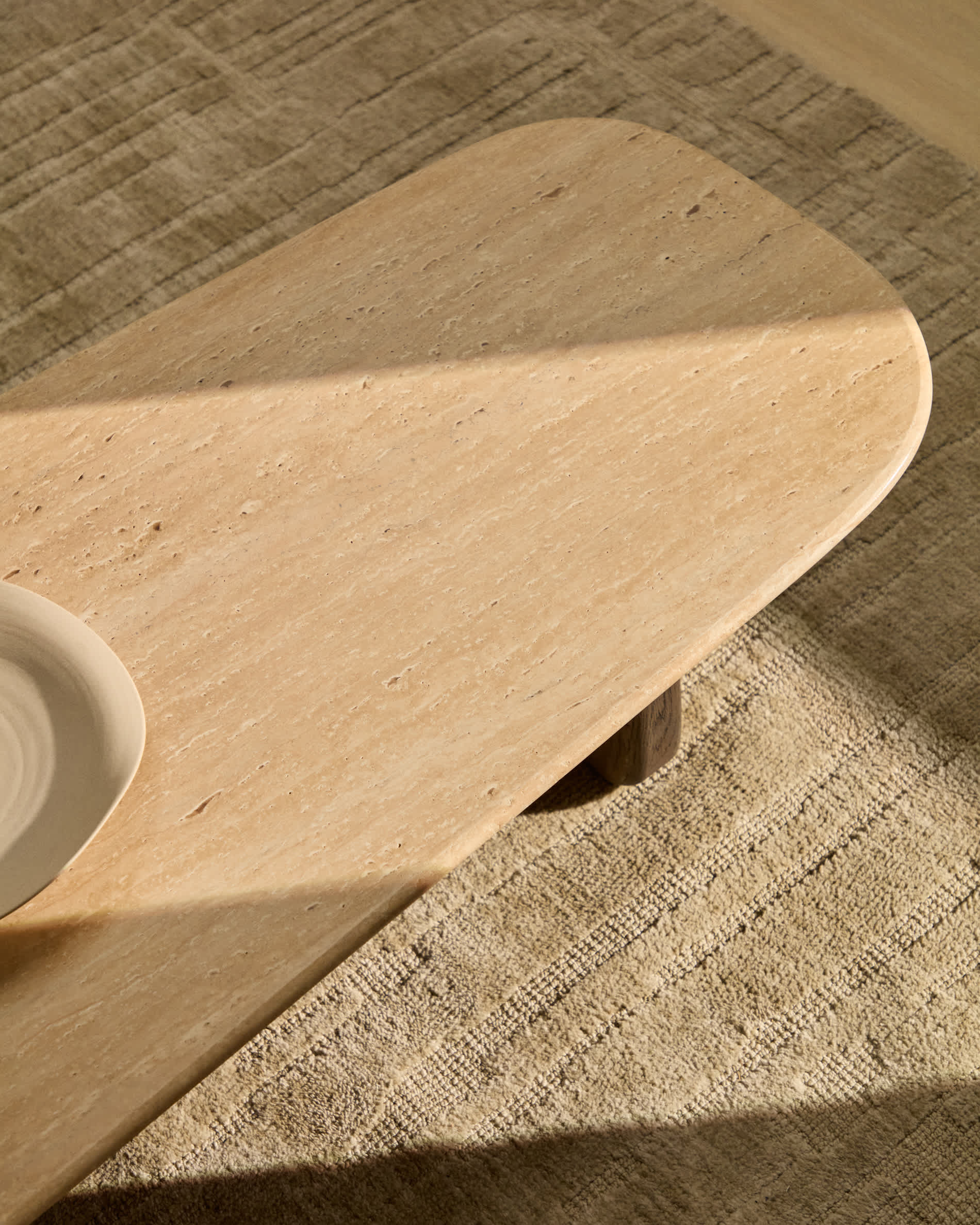 Pirita coffee table in beige travertine with solid oak wood legs with a dark finish 147 x 65cm FSC 100%