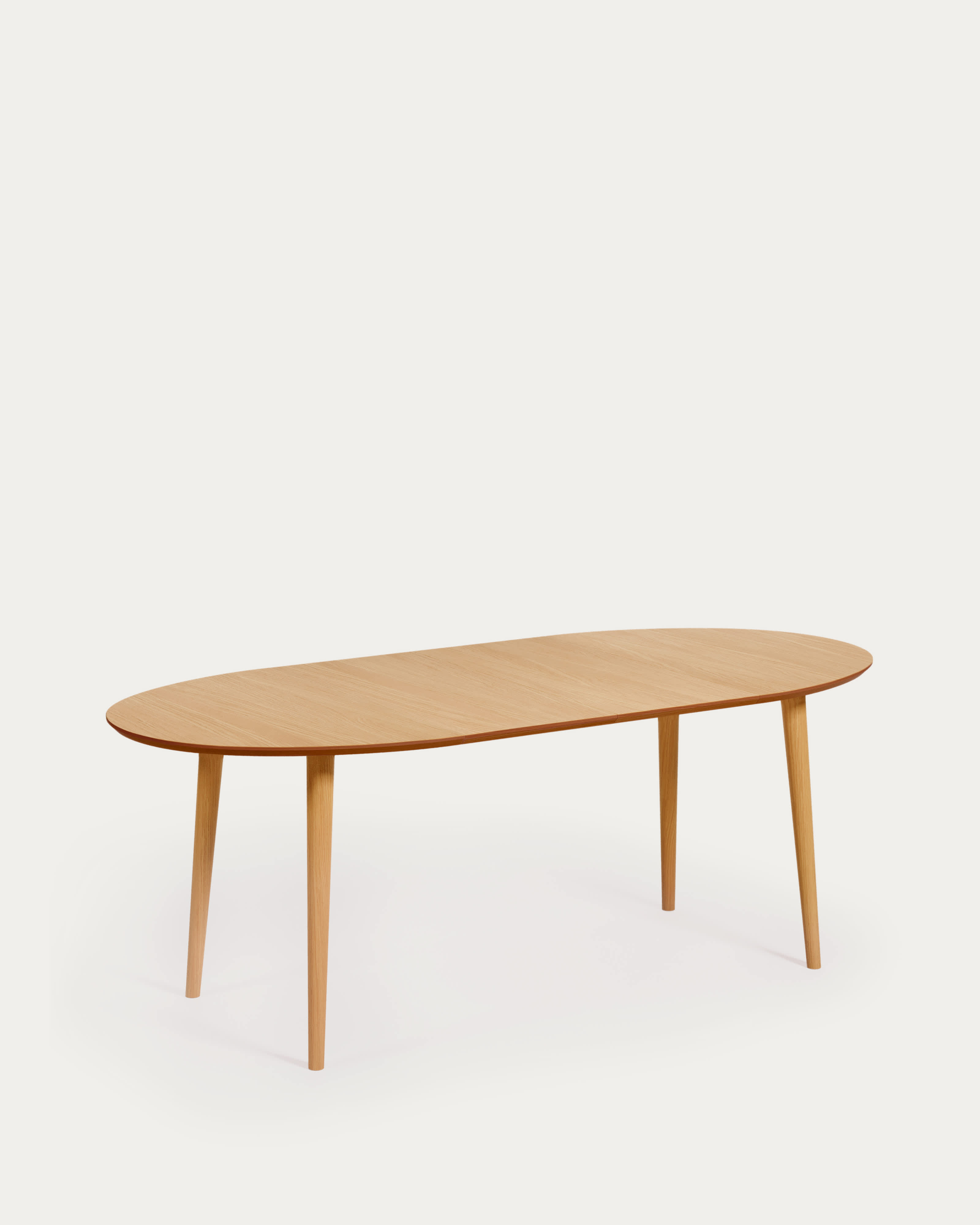 Oqui extendable oval table with an oak veneer and solid wood legs, Ø 120 (200) x 90 cm