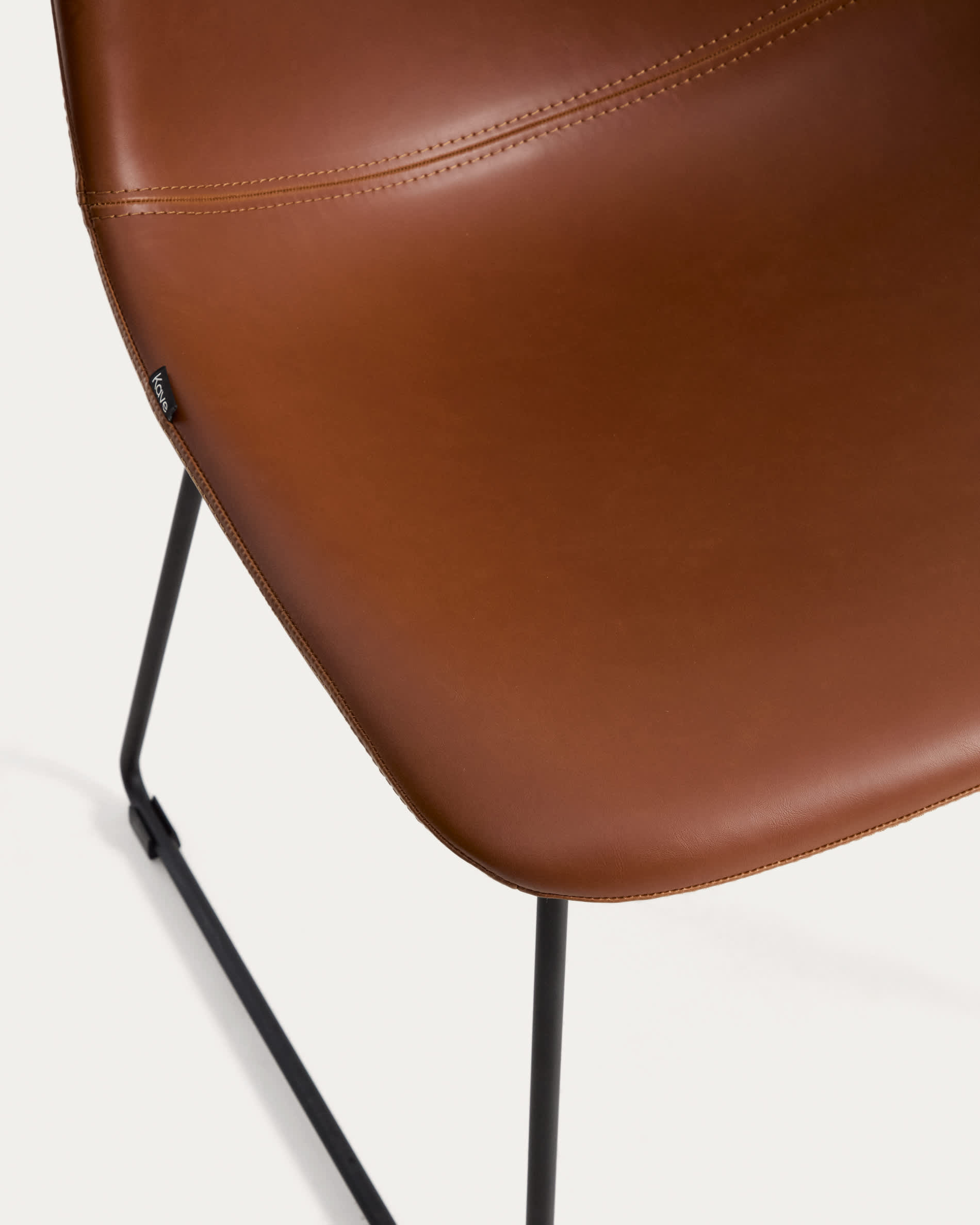 Zahara brown polyurethane chair with steel legs with black finish FSC 100%