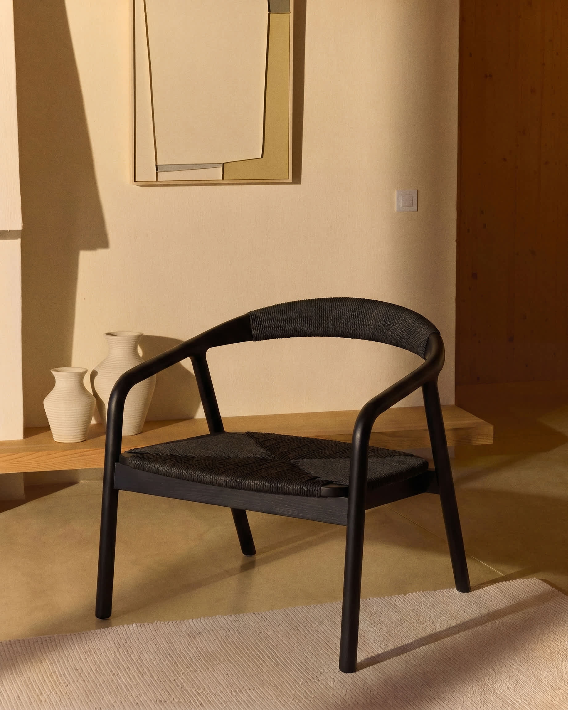 Derile armchair in solid oak wood with black finish and black paper rope FSC Mix Credit.