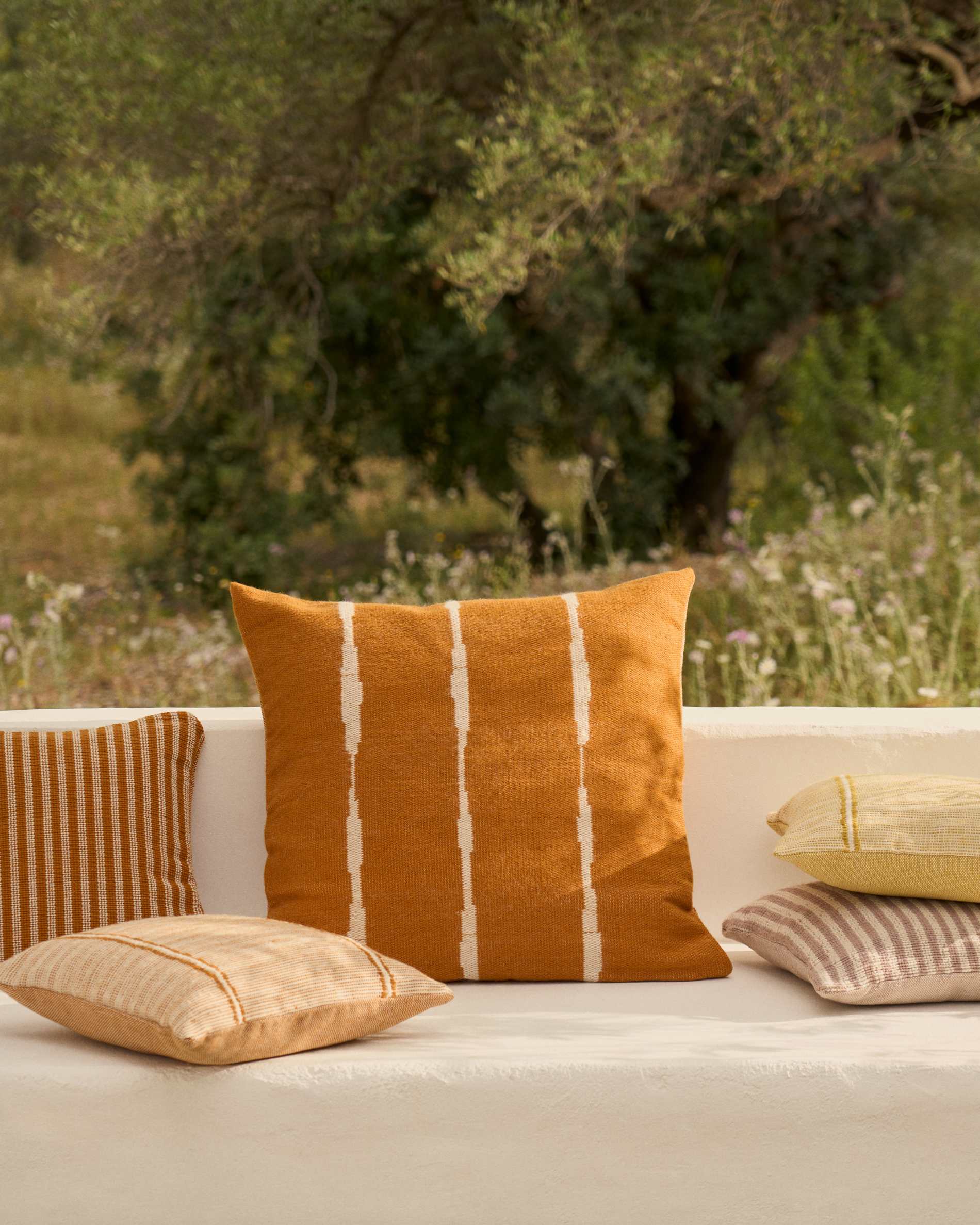 Daila orange 100% PET floor cushion cover with Ikat graphic 70 x 70 cm
