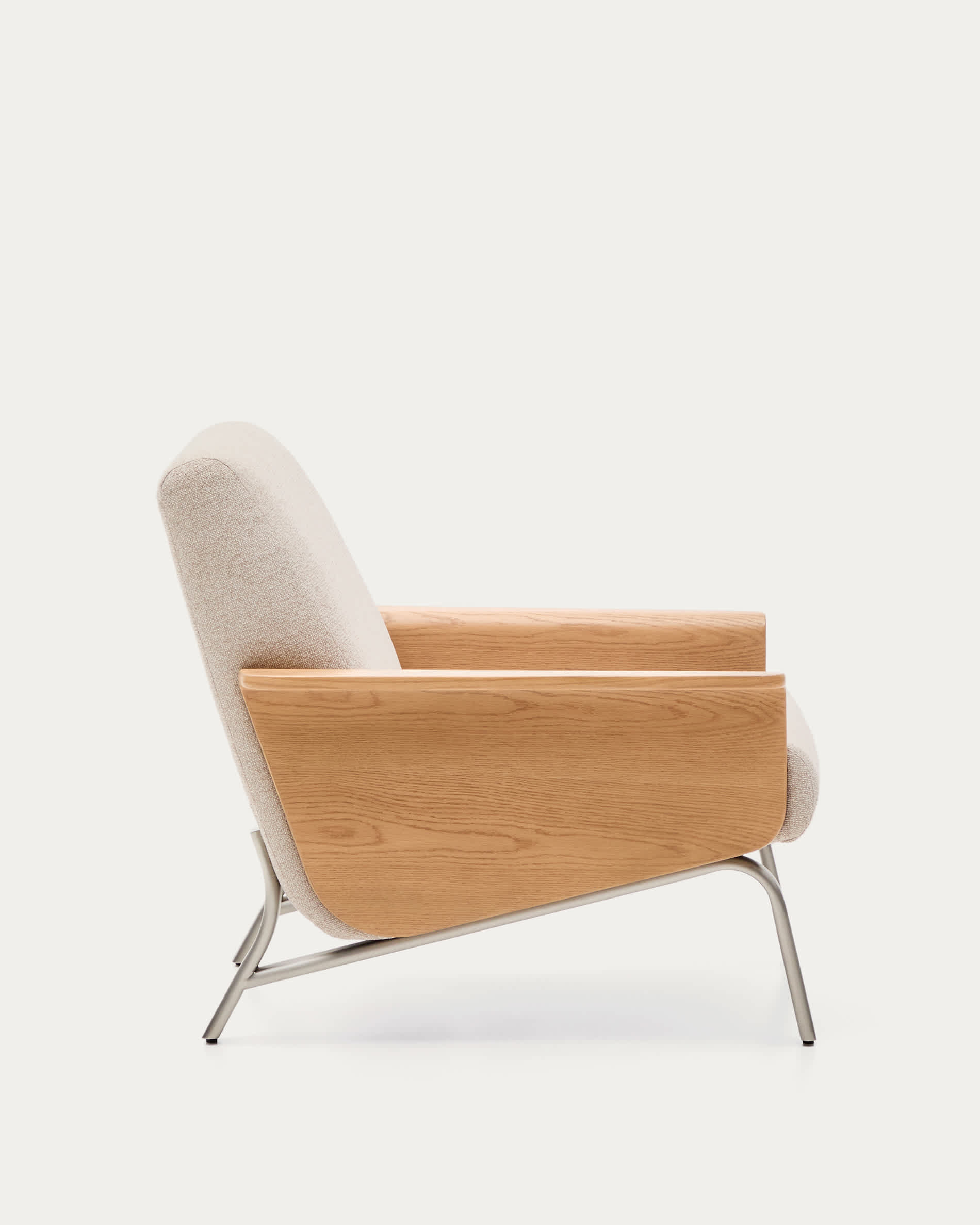 Amsen beige armchair in oak plywood with legs in brushed stainless steel