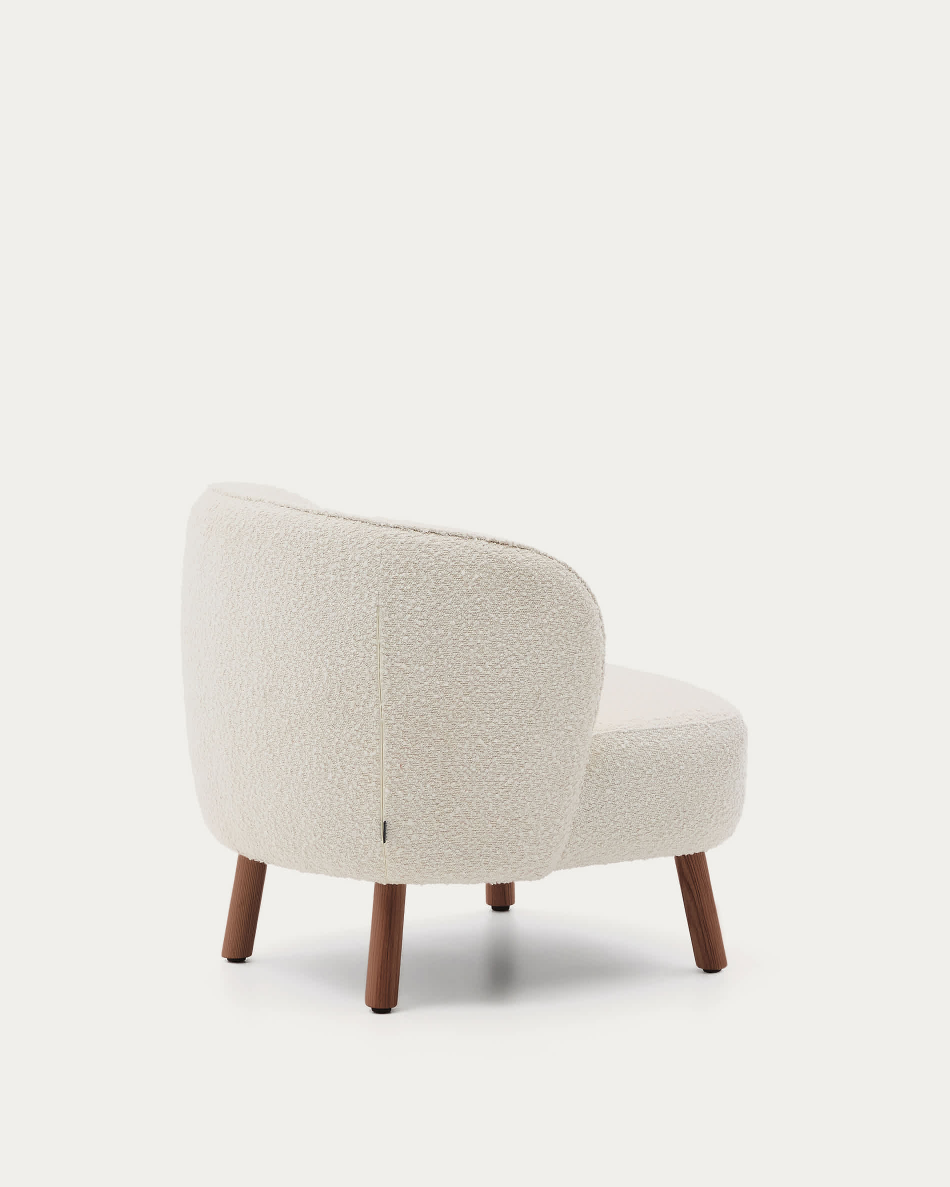 Ulit armchair in white bouclé with solid ash wood legs in a walnut finish