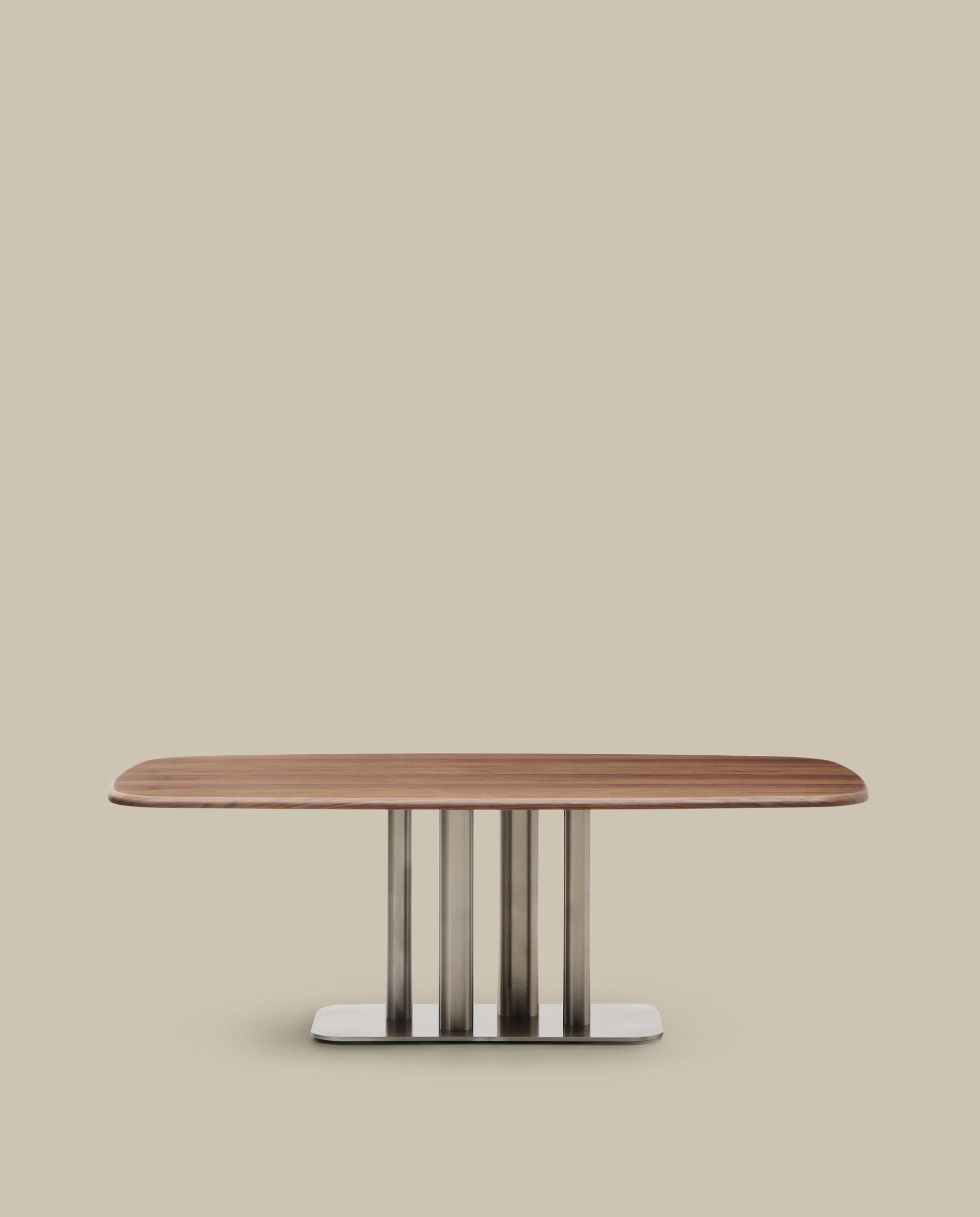 Melvar table made from walnut veneer and legs with brushed stainless steel base 220 x 110cm