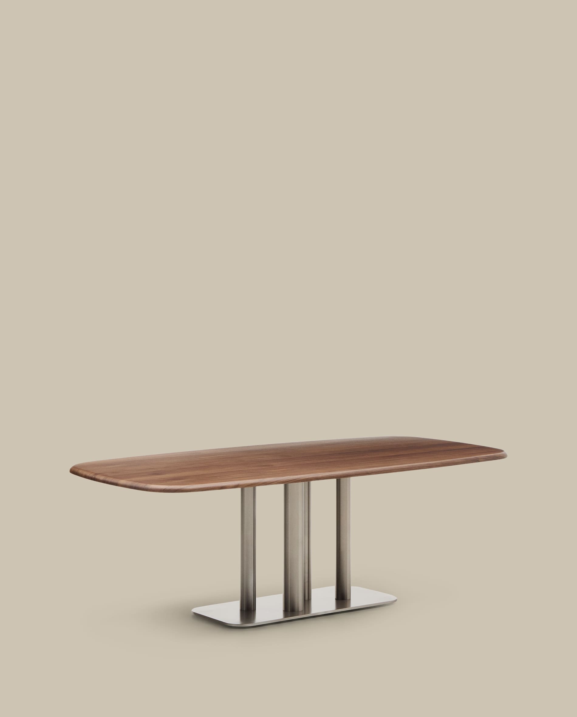 Melvar table made from walnut veneer and legs with brushed stainless steel base 220 x 110cm